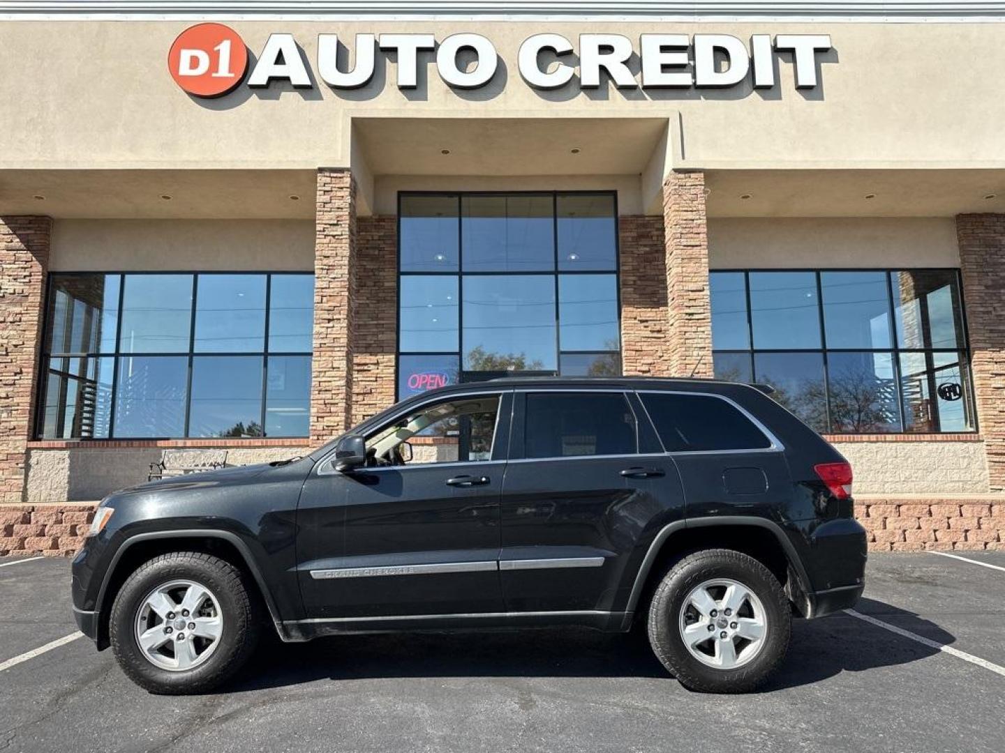 2013 Brilliant Black Crystal Pearlcoat /Dark Graystone/Medium Graystone Jeep Grand Cherokee Laredo (1C4RJFAG1DC) with an 3.6L V6 Flex Fuel 24V VVT engine, Automatic transmission, located at 10890 W. Colfax Ave., Lakewood, CO, 80215, (303) 274-7692, 39.739914, -105.120132 - 2013 Jeep Grand Cherokee<br><br>D1 Auto NEVER charges dealer fees! All cars have clean titles and have been inspected for mechanical issues. We have financing for everyone. Good credit, bad credit, first time buyers.<br>CARFAX One-Owner. Odometer is 6745 miles below market average!<br>Please call La - Photo#0