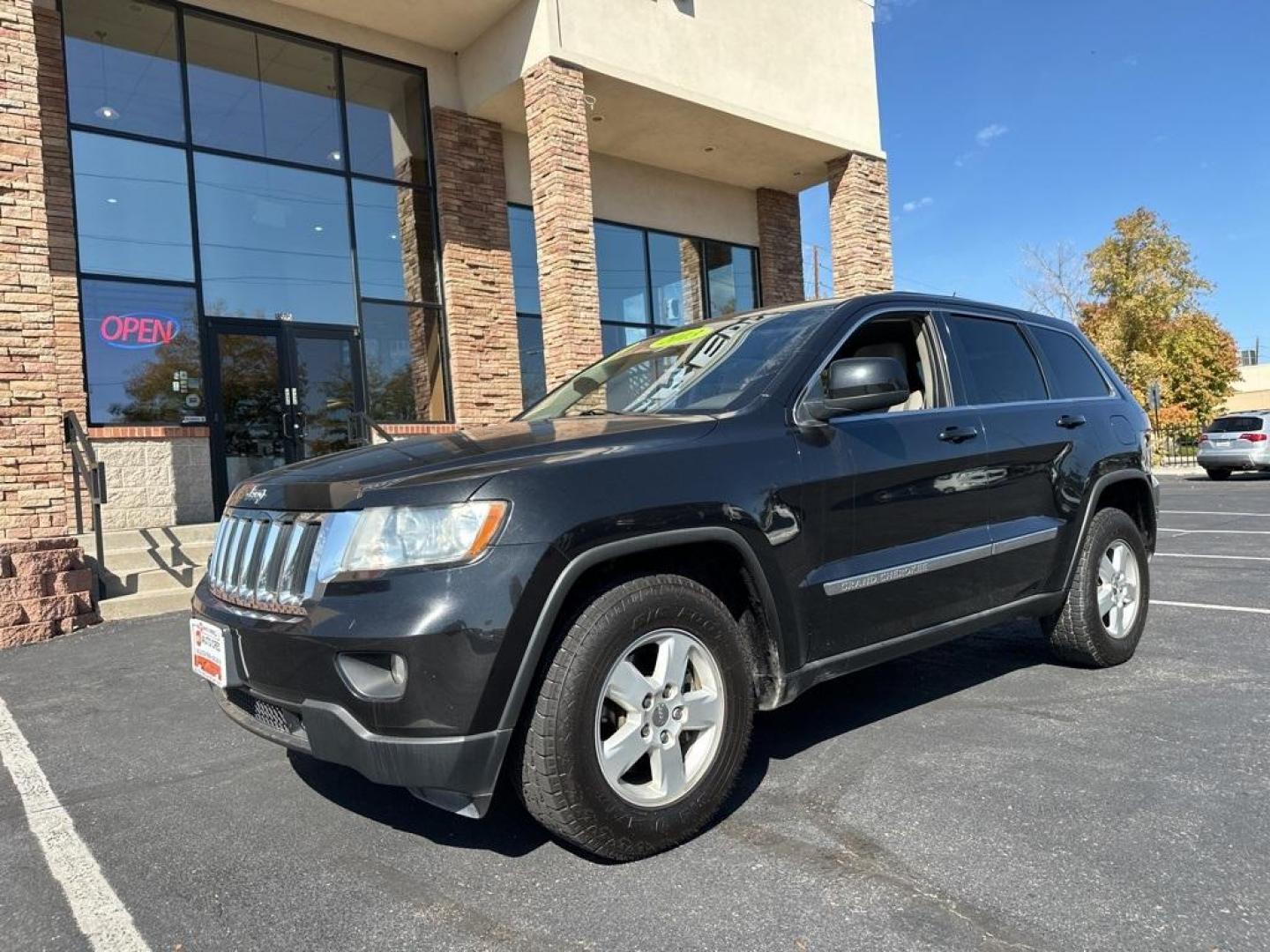 2013 Brilliant Black Crystal Pearlcoat /Dark Graystone/Medium Graystone Jeep Grand Cherokee Laredo (1C4RJFAG1DC) with an 3.6L V6 Flex Fuel 24V VVT engine, Automatic transmission, located at 10890 W. Colfax Ave., Lakewood, CO, 80215, (303) 274-7692, 39.739914, -105.120132 - 2013 Jeep Grand Cherokee<br><br>D1 Auto NEVER charges dealer fees! All cars have clean titles and have been inspected for mechanical issues. We have financing for everyone. Good credit, bad credit, first time buyers.<br>CARFAX One-Owner. Odometer is 6745 miles below market average!<br>Please call La - Photo#1