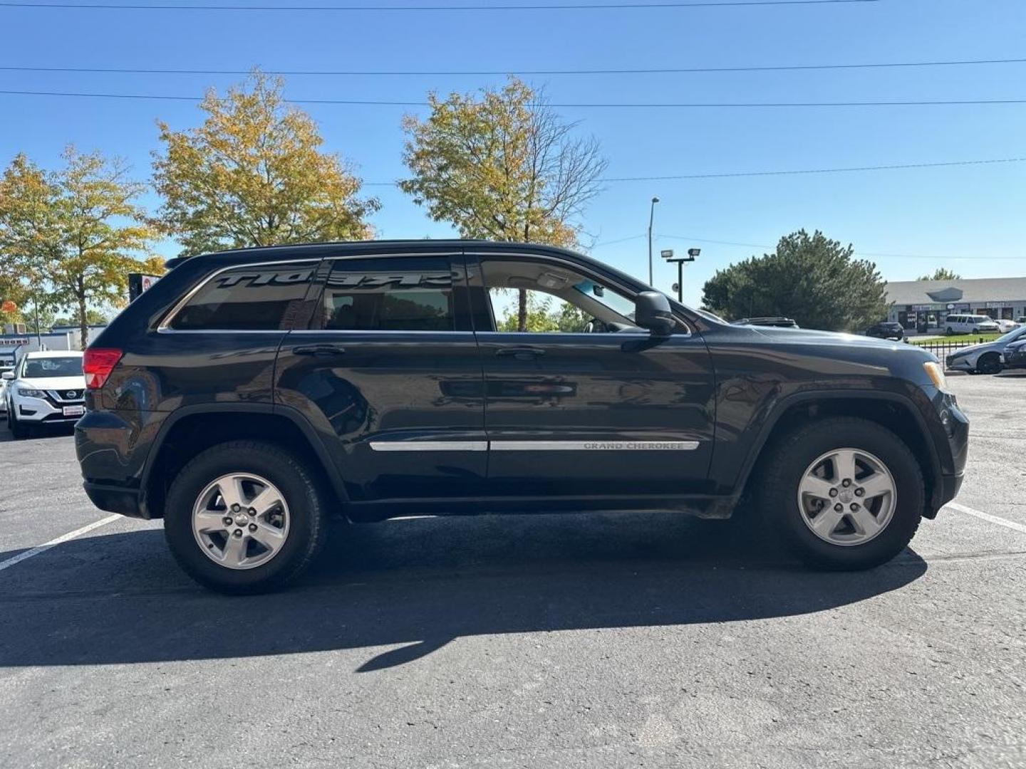 2013 Brilliant Black Crystal Pearlcoat /Dark Graystone/Medium Graystone Jeep Grand Cherokee Laredo (1C4RJFAG1DC) with an 3.6L V6 Flex Fuel 24V VVT engine, Automatic transmission, located at 10890 W. Colfax Ave., Lakewood, CO, 80215, (303) 274-7692, 39.739914, -105.120132 - 2013 Jeep Grand Cherokee<br><br>D1 Auto NEVER charges dealer fees! All cars have clean titles and have been inspected for mechanical issues. We have financing for everyone. Good credit, bad credit, first time buyers.<br>CARFAX One-Owner. Odometer is 6745 miles below market average!<br>Please call La - Photo#4