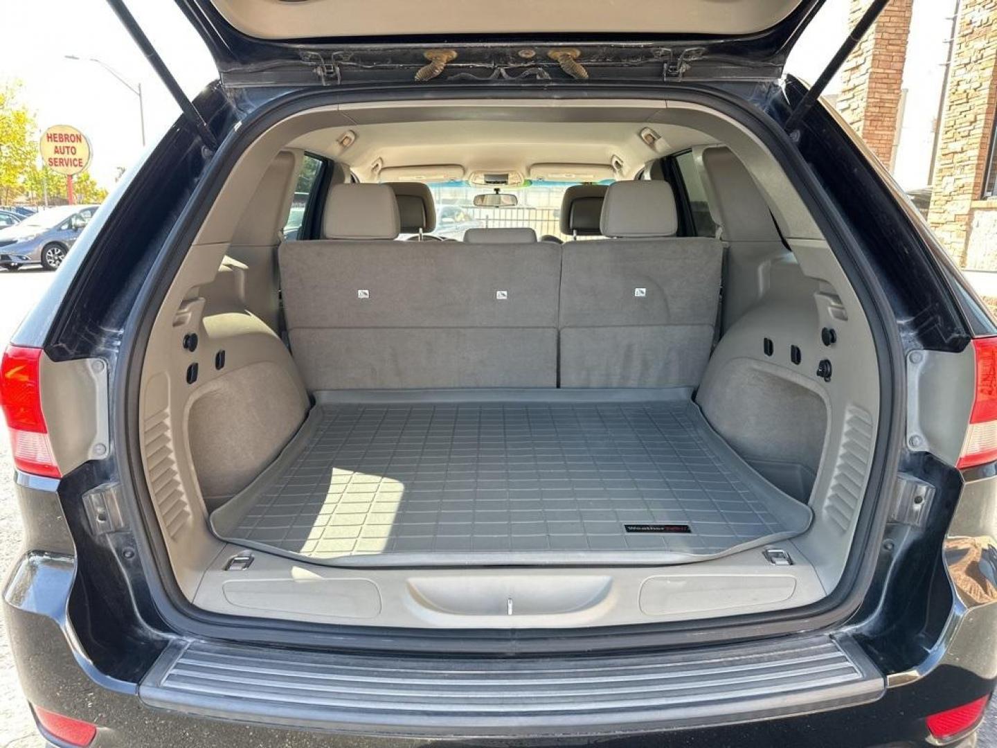 2013 Brilliant Black Crystal Pearlcoat /Dark Graystone/Medium Graystone Jeep Grand Cherokee Laredo (1C4RJFAG1DC) with an 3.6L V6 Flex Fuel 24V VVT engine, Automatic transmission, located at 10890 W. Colfax Ave., Lakewood, CO, 80215, (303) 274-7692, 39.739914, -105.120132 - 2013 Jeep Grand Cherokee<br><br>D1 Auto NEVER charges dealer fees! All cars have clean titles and have been inspected for mechanical issues. We have financing for everyone. Good credit, bad credit, first time buyers.<br>CARFAX One-Owner. Odometer is 6745 miles below market average!<br>Please call La - Photo#10