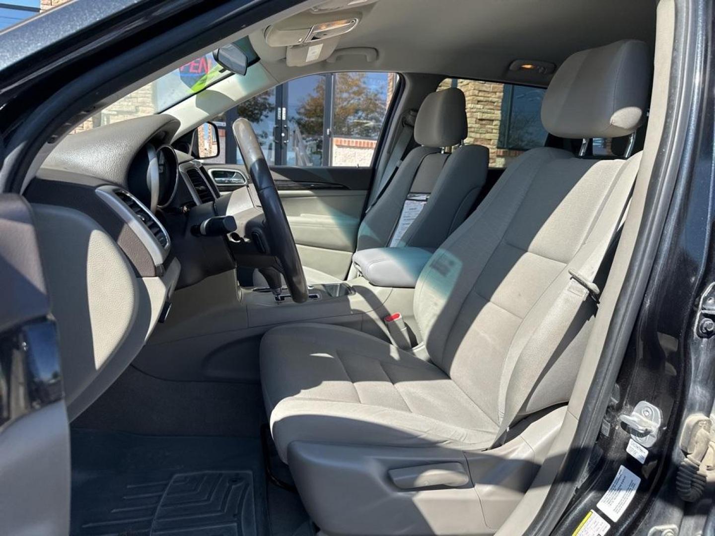 2013 Brilliant Black Crystal Pearlcoat /Dark Graystone/Medium Graystone Jeep Grand Cherokee Laredo (1C4RJFAG1DC) with an 3.6L V6 Flex Fuel 24V VVT engine, Automatic transmission, located at 10890 W. Colfax Ave., Lakewood, CO, 80215, (303) 274-7692, 39.739914, -105.120132 - 2013 Jeep Grand Cherokee<br><br>D1 Auto NEVER charges dealer fees! All cars have clean titles and have been inspected for mechanical issues. We have financing for everyone. Good credit, bad credit, first time buyers.<br>CARFAX One-Owner. Odometer is 6745 miles below market average!<br>Please call La - Photo#12
