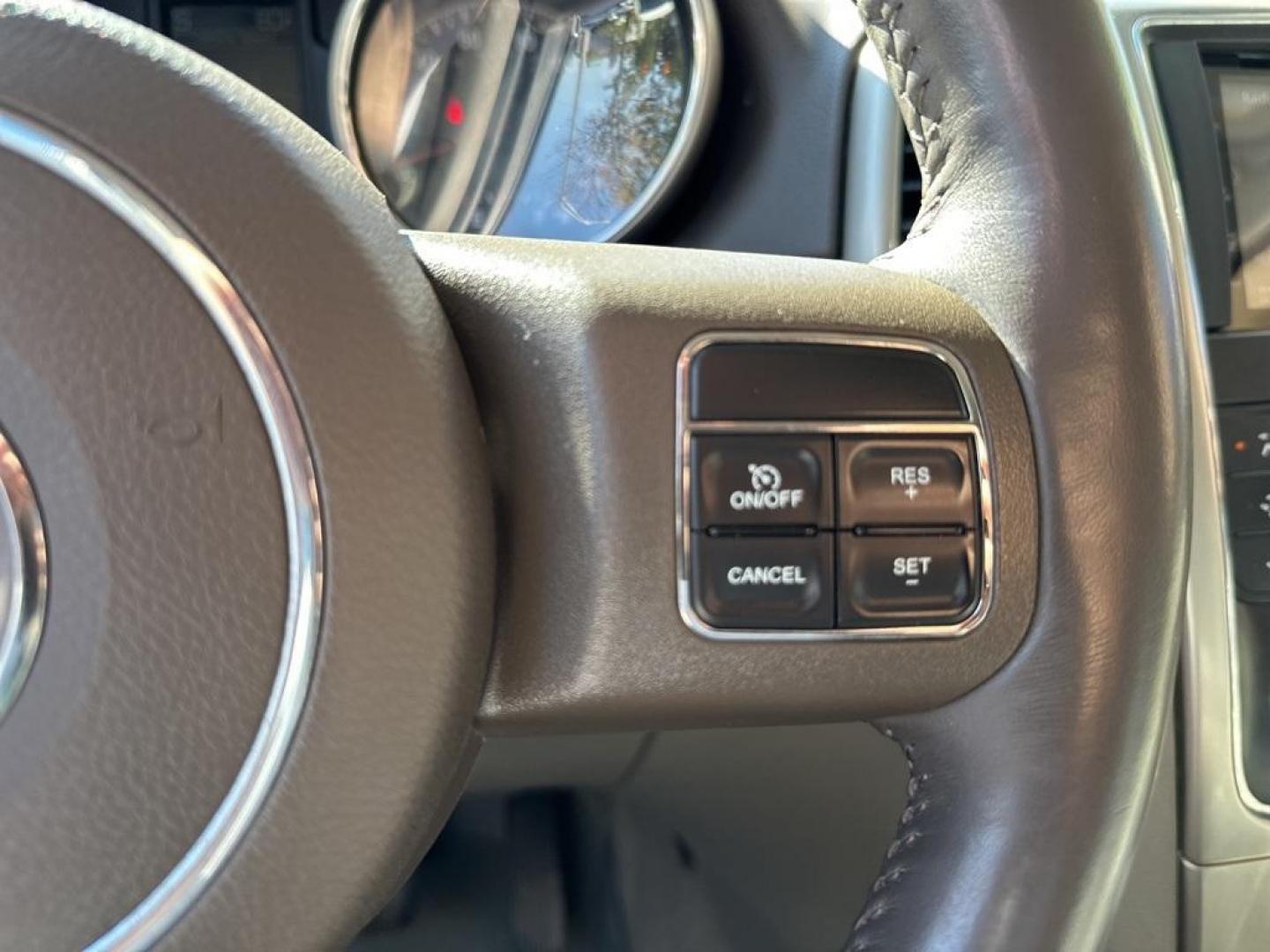 2013 Brilliant Black Crystal Pearlcoat /Dark Graystone/Medium Graystone Jeep Grand Cherokee Laredo (1C4RJFAG1DC) with an 3.6L V6 Flex Fuel 24V VVT engine, Automatic transmission, located at 10890 W. Colfax Ave., Lakewood, CO, 80215, (303) 274-7692, 39.739914, -105.120132 - 2013 Jeep Grand Cherokee<br><br>D1 Auto NEVER charges dealer fees! All cars have clean titles and have been inspected for mechanical issues. We have financing for everyone. Good credit, bad credit, first time buyers.<br>CARFAX One-Owner. Odometer is 6745 miles below market average!<br>Please call La - Photo#18