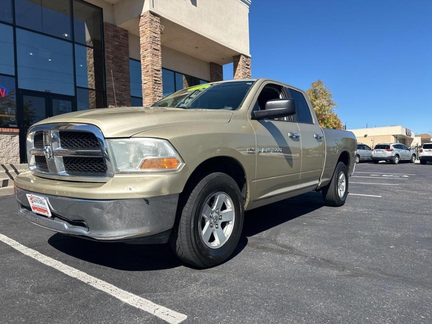 2011 White Gold Clearcoat /Dark Slate/Medium Graystone Ram 1500 SLT (1D7RV1GT8BS) with an HEMI 5.7L V8 Multi Displacement VVT engine, Automatic transmission, located at 10890 W. Colfax Ave., Lakewood, CO, 80215, (303) 274-7692, 39.739914, -105.120132 - 2011 Ram 1500<br><br>D1 Auto NEVER charges dealer fees! All cars have clean titles and have been inspected for mechanical issues. We have financing for everyone. Good credit, bad credit, first time buyers.<br><br>Please call Lakewood Location 303-274-7692 or Thornton 303-287-5511 to schedule a test - Photo#1