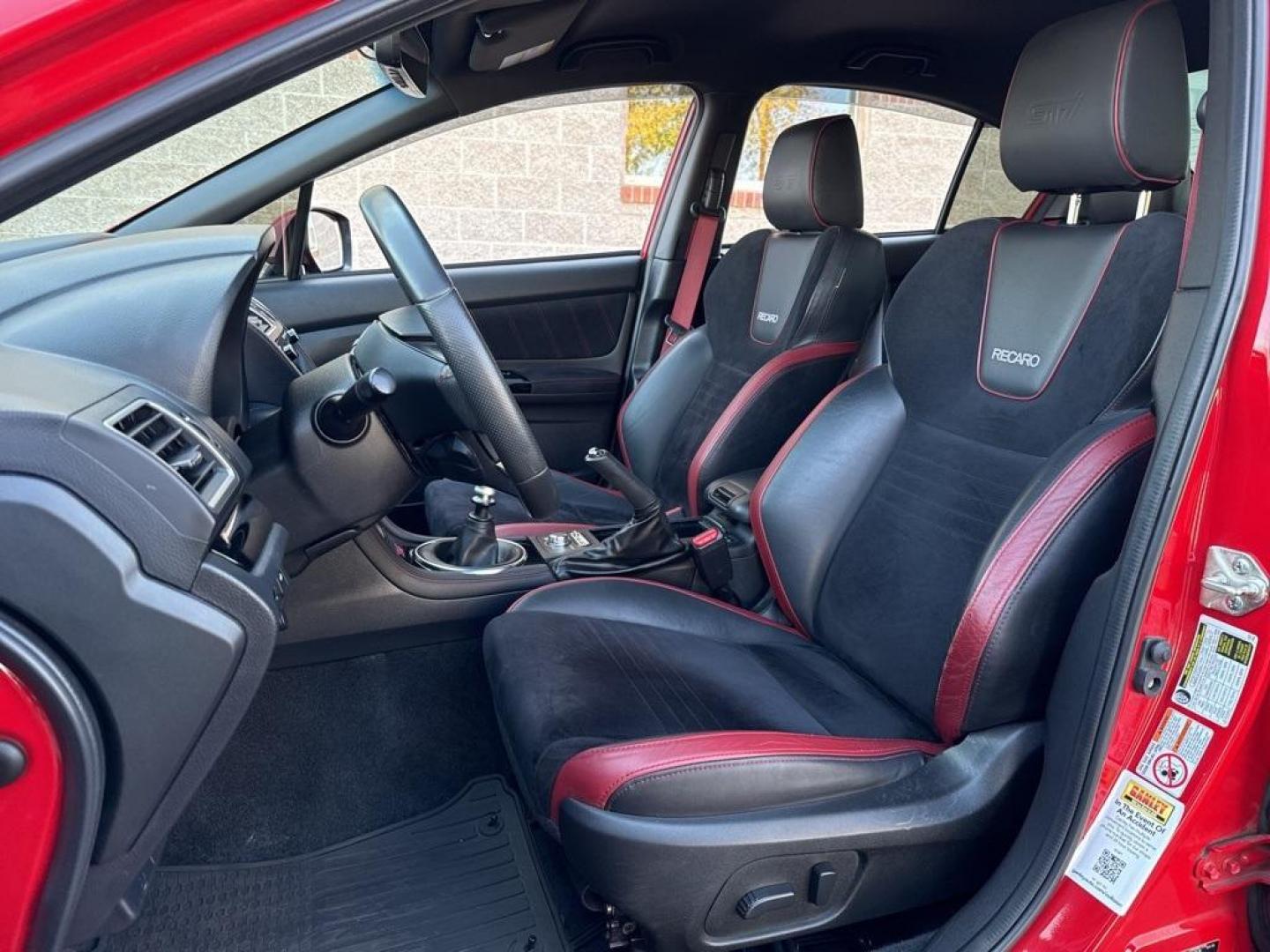 2019 Pure Red /Black/Carbon Black Subaru WRX STi (JF1VA2S64K9) with an 2.5L DOHC Intercooled High Boost Turbocharged engine, Manual transmission, located at 10890 W. Colfax Ave., Lakewood, CO, 80215, (303) 274-7692, 39.739914, -105.120132 - 2019 Subaru WRX STI with low miles and in excellent condition insdie and out!<br>All Cars Have Clean Titles And Are Serviced Before Sale.Apple/Android Car Play, Blind Spot Monitoring, Backup Camera, Leather, Heated Seats, Bluetooth/ With Bluetooth Audio, Non Smoker, No Pet Odor Or Hair, WRX STi, Clo - Photo#10