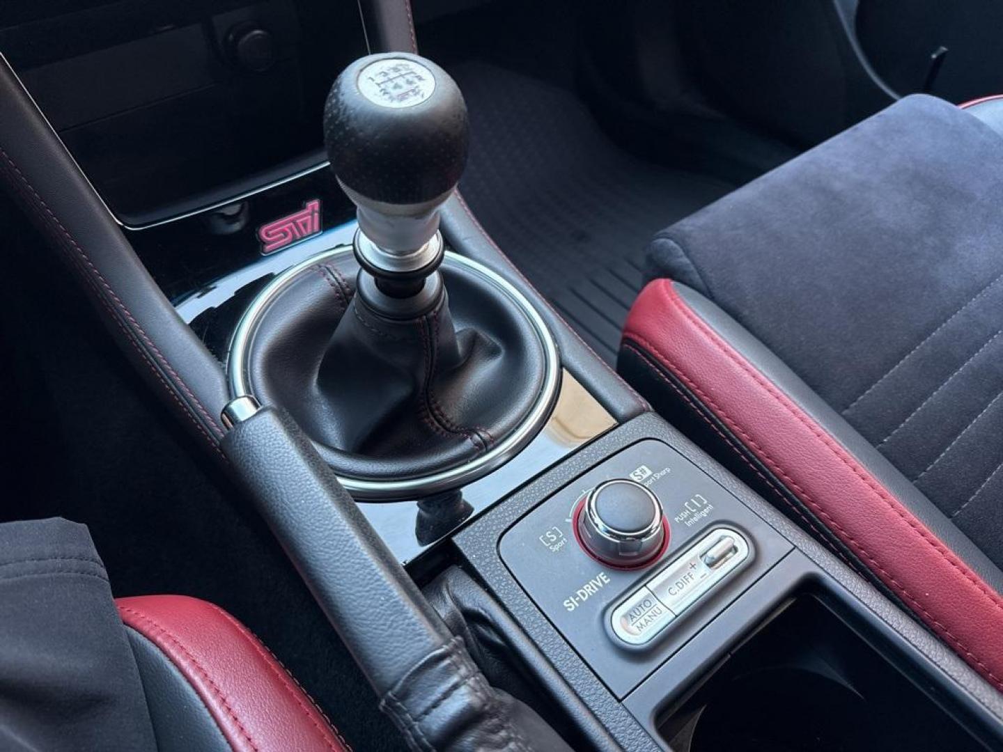 2019 Pure Red /Black/Carbon Black Subaru WRX STi (JF1VA2S64K9) with an 2.5L DOHC Intercooled High Boost Turbocharged engine, Manual transmission, located at 10890 W. Colfax Ave., Lakewood, CO, 80215, (303) 274-7692, 39.739914, -105.120132 - 2019 Subaru WRX STI with low miles and in excellent condition insdie and out!<br>All Cars Have Clean Titles And Are Serviced Before Sale.Apple/Android Car Play, Blind Spot Monitoring, Backup Camera, Leather, Heated Seats, Bluetooth/ With Bluetooth Audio, Non Smoker, No Pet Odor Or Hair, WRX STi, Clo - Photo#17