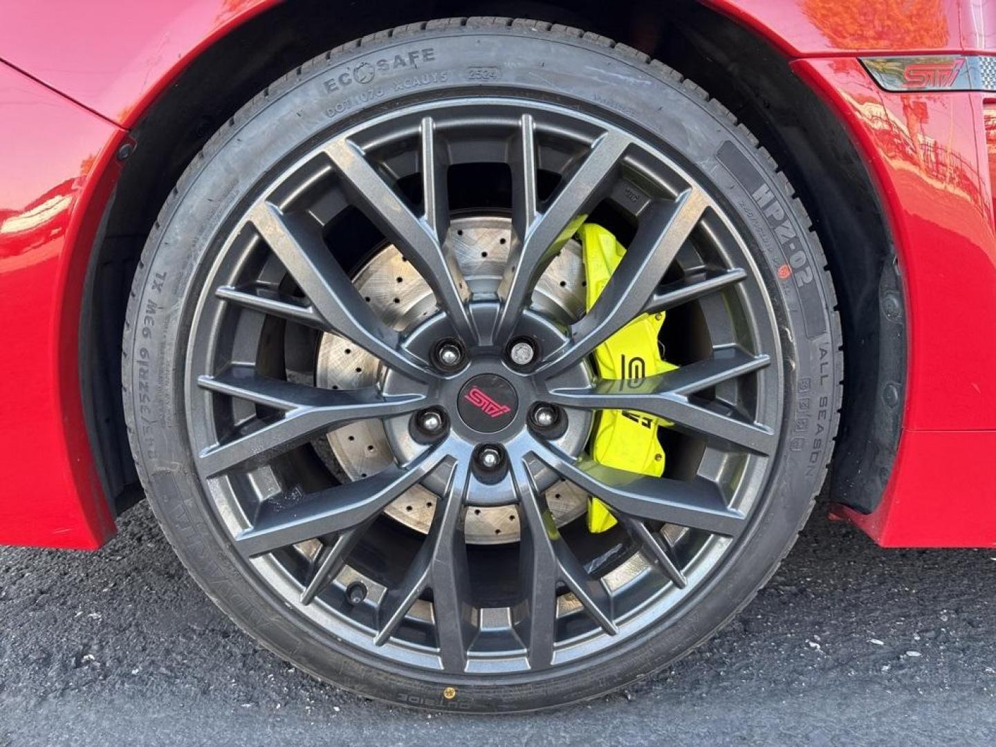 2019 Pure Red /Black/Carbon Black Subaru WRX STi (JF1VA2S64K9) with an 2.5L DOHC Intercooled High Boost Turbocharged engine, Manual transmission, located at 10890 W. Colfax Ave., Lakewood, CO, 80215, (303) 274-7692, 39.739914, -105.120132 - 2019 Subaru WRX STI with low miles and in excellent condition insdie and out!<br>All Cars Have Clean Titles And Are Serviced Before Sale.Apple/Android Car Play, Blind Spot Monitoring, Backup Camera, Leather, Heated Seats, Bluetooth/ With Bluetooth Audio, Non Smoker, No Pet Odor Or Hair, WRX STi, Clo - Photo#26