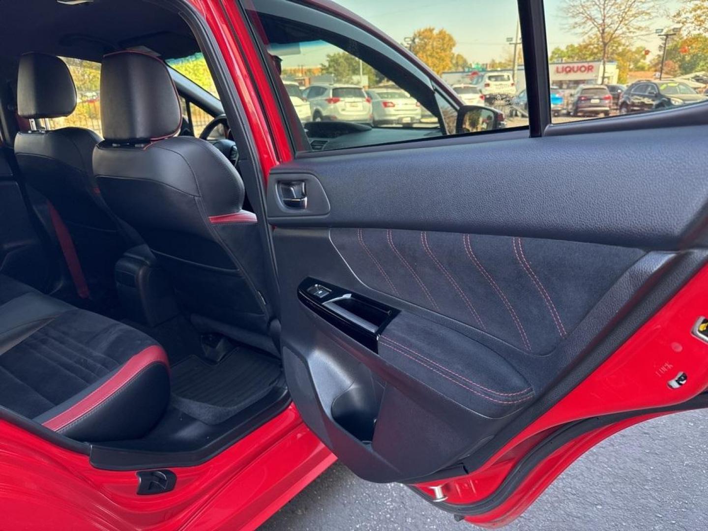 2019 Pure Red /Black/Carbon Black Subaru WRX STi (JF1VA2S64K9) with an 2.5L DOHC Intercooled High Boost Turbocharged engine, Manual transmission, located at 10890 W. Colfax Ave., Lakewood, CO, 80215, (303) 274-7692, 39.739914, -105.120132 - 2019 Subaru WRX STI with low miles and in excellent condition insdie and out!<br>All Cars Have Clean Titles And Are Serviced Before Sale.Apple/Android Car Play, Blind Spot Monitoring, Backup Camera, Leather, Heated Seats, Bluetooth/ With Bluetooth Audio, Non Smoker, No Pet Odor Or Hair, WRX STi, Clo - Photo#30