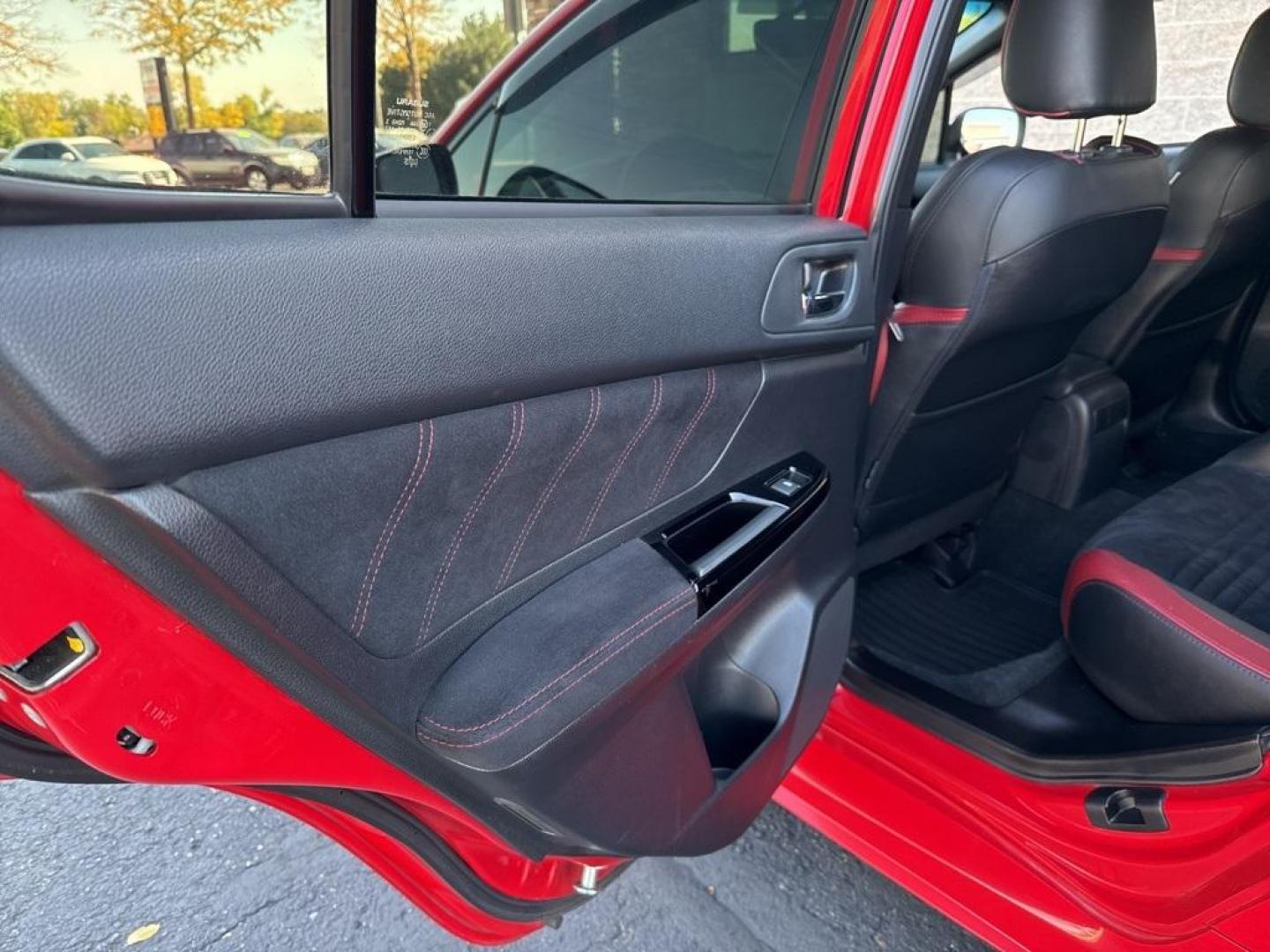 2019 Pure Red /Black/Carbon Black Subaru WRX STi (JF1VA2S64K9) with an 2.5L DOHC Intercooled High Boost Turbocharged engine, Manual transmission, located at 10890 W. Colfax Ave., Lakewood, CO, 80215, (303) 274-7692, 39.739914, -105.120132 - 2019 Subaru WRX STI with low miles and in excellent condition insdie and out!<br>All Cars Have Clean Titles And Are Serviced Before Sale.Apple/Android Car Play, Blind Spot Monitoring, Backup Camera, Leather, Heated Seats, Bluetooth/ With Bluetooth Audio, Non Smoker, No Pet Odor Or Hair, WRX STi, Clo - Photo#31