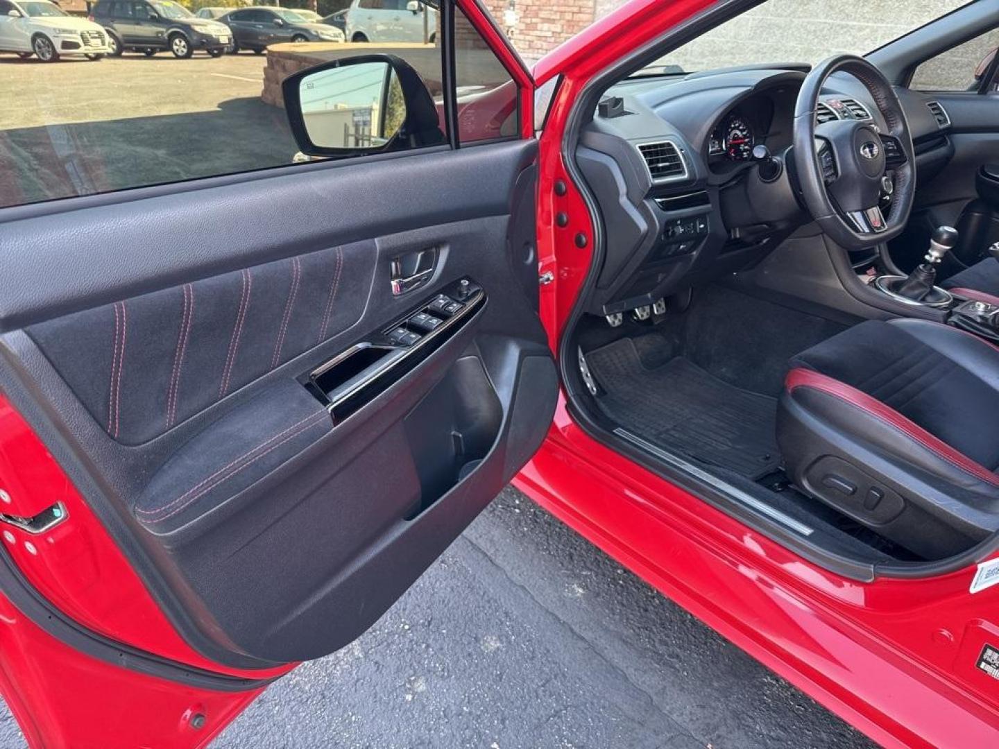 2019 Pure Red /Black/Carbon Black Subaru WRX STi (JF1VA2S64K9) with an 2.5L DOHC Intercooled High Boost Turbocharged engine, Manual transmission, located at 10890 W. Colfax Ave., Lakewood, CO, 80215, (303) 274-7692, 39.739914, -105.120132 - 2019 Subaru WRX STI with low miles and in excellent condition insdie and out!<br>All Cars Have Clean Titles And Are Serviced Before Sale.Apple/Android Car Play, Blind Spot Monitoring, Backup Camera, Leather, Heated Seats, Bluetooth/ With Bluetooth Audio, Non Smoker, No Pet Odor Or Hair, WRX STi, Clo - Photo#32