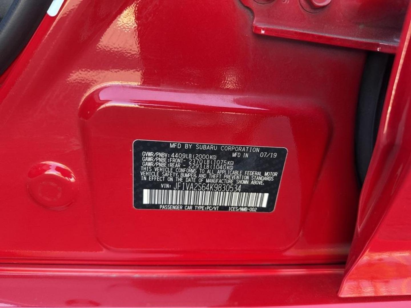 2019 Pure Red /Black/Carbon Black Subaru WRX STi (JF1VA2S64K9) with an 2.5L DOHC Intercooled High Boost Turbocharged engine, Manual transmission, located at 10890 W. Colfax Ave., Lakewood, CO, 80215, (303) 274-7692, 39.739914, -105.120132 - 2019 Subaru WRX STI with low miles and in excellent condition insdie and out!<br>All Cars Have Clean Titles And Are Serviced Before Sale.Apple/Android Car Play, Blind Spot Monitoring, Backup Camera, Leather, Heated Seats, Bluetooth/ With Bluetooth Audio, Non Smoker, No Pet Odor Or Hair, WRX STi, Clo - Photo#33