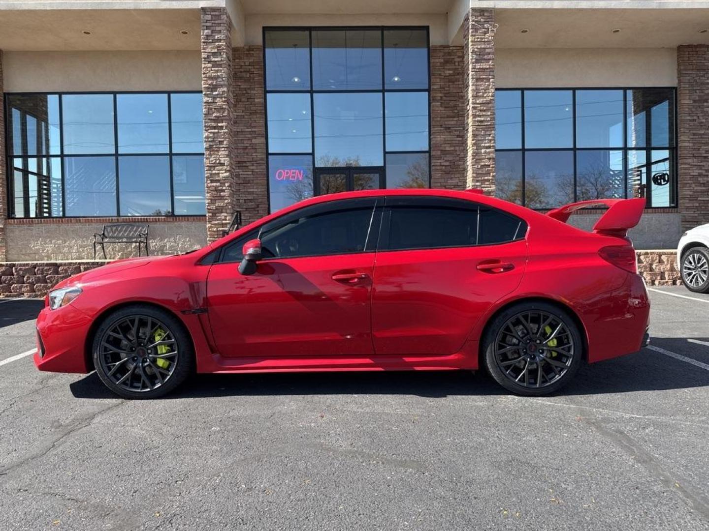 2019 Pure Red /Black/Carbon Black Subaru WRX STi (JF1VA2S64K9) with an 2.5L DOHC Intercooled High Boost Turbocharged engine, Manual transmission, located at 10890 W. Colfax Ave., Lakewood, CO, 80215, (303) 274-7692, 39.739914, -105.120132 - 2019 Subaru WRX STI with low miles and in excellent condition insdie and out!<br>All Cars Have Clean Titles And Are Serviced Before Sale.Apple/Android Car Play, Blind Spot Monitoring, Backup Camera, Leather, Heated Seats, Bluetooth/ With Bluetooth Audio, Non Smoker, No Pet Odor Or Hair, WRX STi, Clo - Photo#3