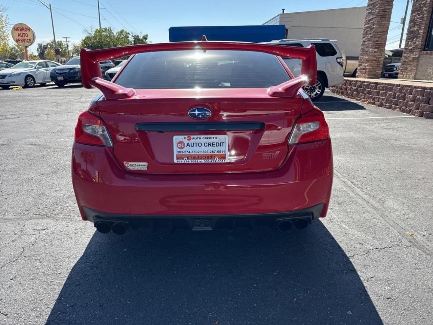 2019 Pure Red /Black/Carbon Black Subaru WRX STi (JF1VA2S64K9) with an 2.5L DOHC Intercooled High Boost Turbocharged engine, Manual transmission, located at 10890 W. Colfax Ave., Lakewood, CO, 80215, (303) 274-7692, 39.739914, -105.120132 - 2019 Subaru WRX STI with low miles and in excellent condition insdie and out!<br>All Cars Have Clean Titles And Are Serviced Before Sale.Apple/Android Car Play, Blind Spot Monitoring, Backup Camera, Leather, Heated Seats, Bluetooth/ With Bluetooth Audio, Non Smoker, No Pet Odor Or Hair, WRX STi, Clo - Photo#6