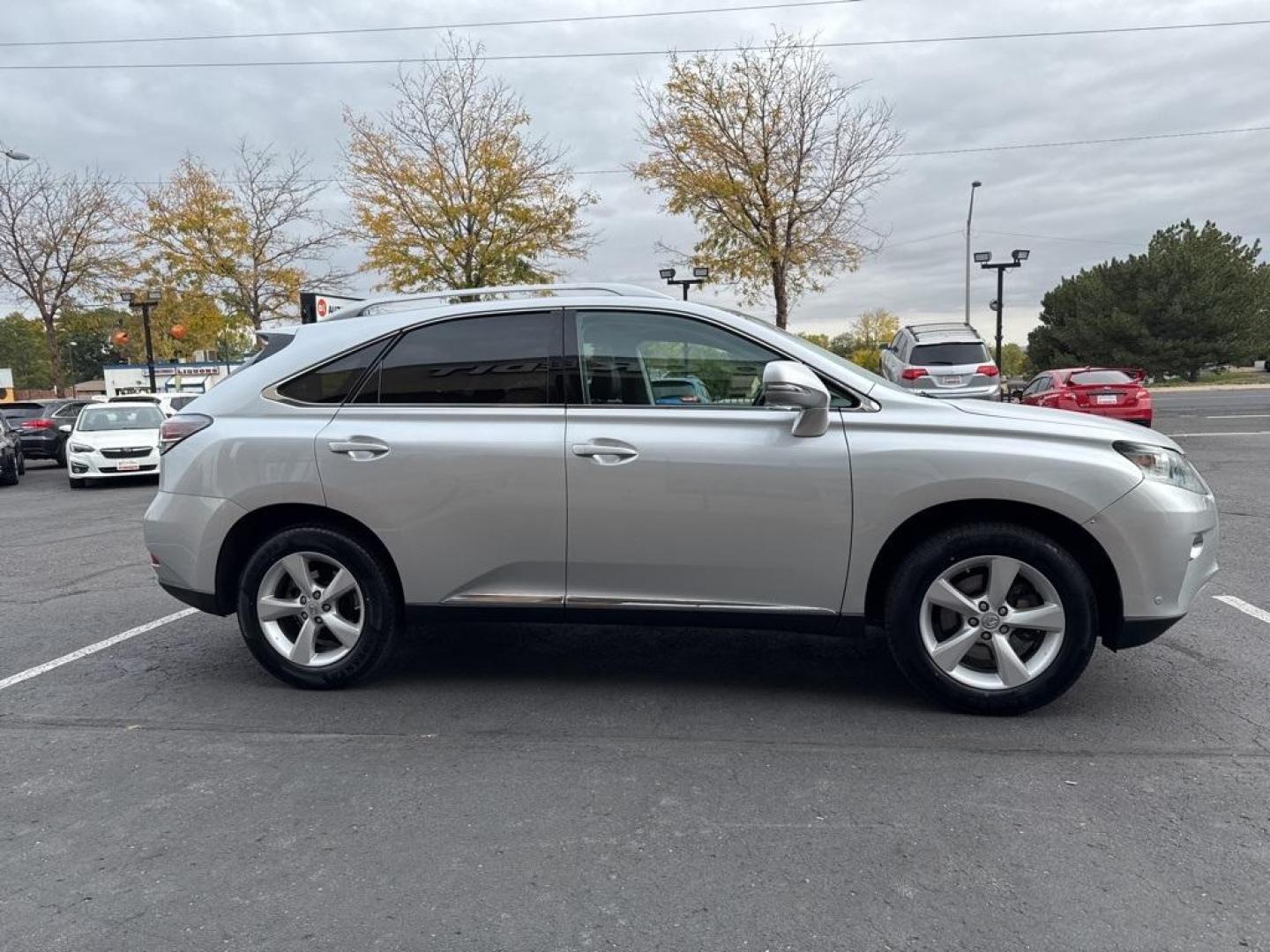 2015 Silver Lining Metallic /Black Lexus RX 350 (2T2BK1BAXFC) with an 3.5L V6 DOHC Dual VVT-i 24V engine, Automatic transmission, located at 10890 W. Colfax Ave., Lakewood, CO, 80215, (303) 274-7692, 39.739914, -105.120132 - 2015 Lexus RX 350 fully serviced including new tires. Clean Carfax and loaded with, heated and cooled seats, blindspot monitoring, backup camera, Bluetooth, sun roof and much more. This car has no signs of ever having pets or a smoker in it. <br>All Cars Have Clean Titles And Are Serviced Before Sal - Photo#1