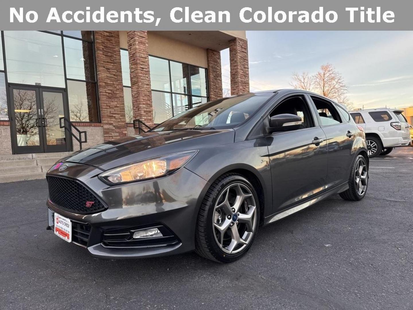 2016 GRAY Ford Focus ST (1FADP3L92GL) with an 4 Cyl, 2.0L engine, Manual transmission, located at 10890 W. Colfax Ave., Lakewood, CO, 80215, (303) 274-7692, 39.739914, -105.120132 - <b>Summary</b><br>Completley stock ST and zero signs of abuse. This is probaly the cleanest one in town. Fully serviced including new turbo and new tires. So much fun to drive! No Accidents and ready to go!<br><br><b>Vehicle Details</b><br>Discover the 2016 Ford Focus ST, a dynamic blend of performa - Photo#38