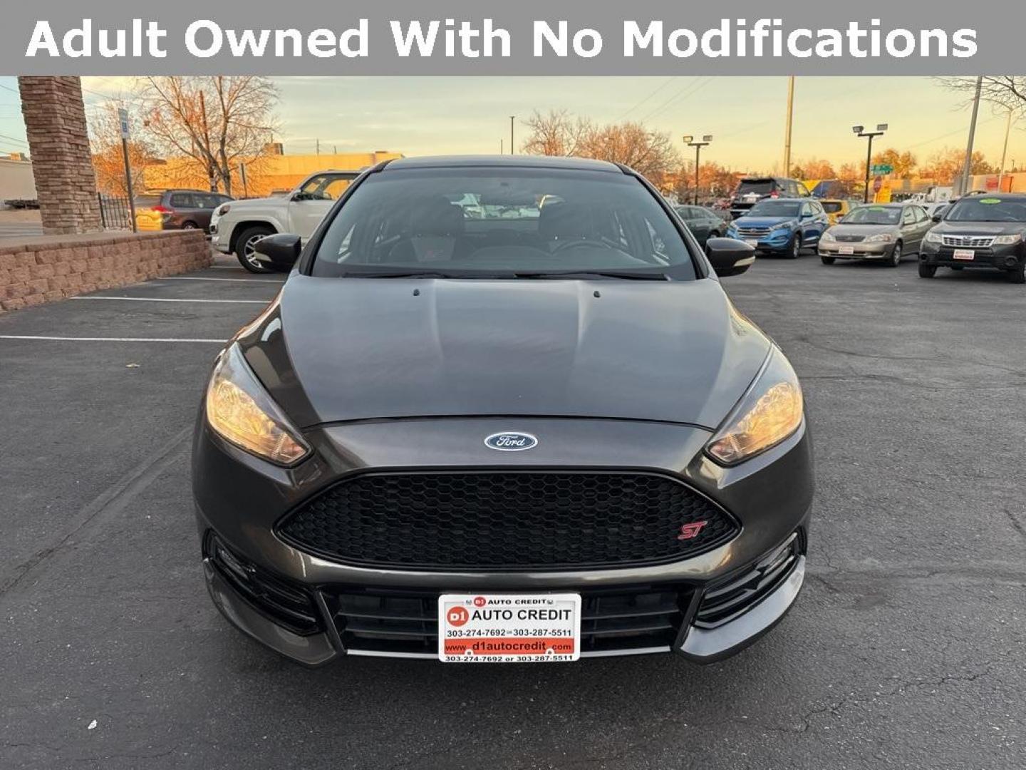 2016 GRAY Ford Focus ST (1FADP3L92GL) with an 4 Cyl, 2.0L engine, Manual transmission, located at 10890 W. Colfax Ave., Lakewood, CO, 80215, (303) 274-7692, 39.739914, -105.120132 - <b>Summary</b><br>Completley stock ST and zero signs of abuse. This is probaly the cleanest one in town. Fully serviced including new turbo and new tires. So much fun to drive! No Accidents and ready to go!<br><br><b>Vehicle Details</b><br>Discover the 2016 Ford Focus ST, a dynamic blend of performa - Photo#39