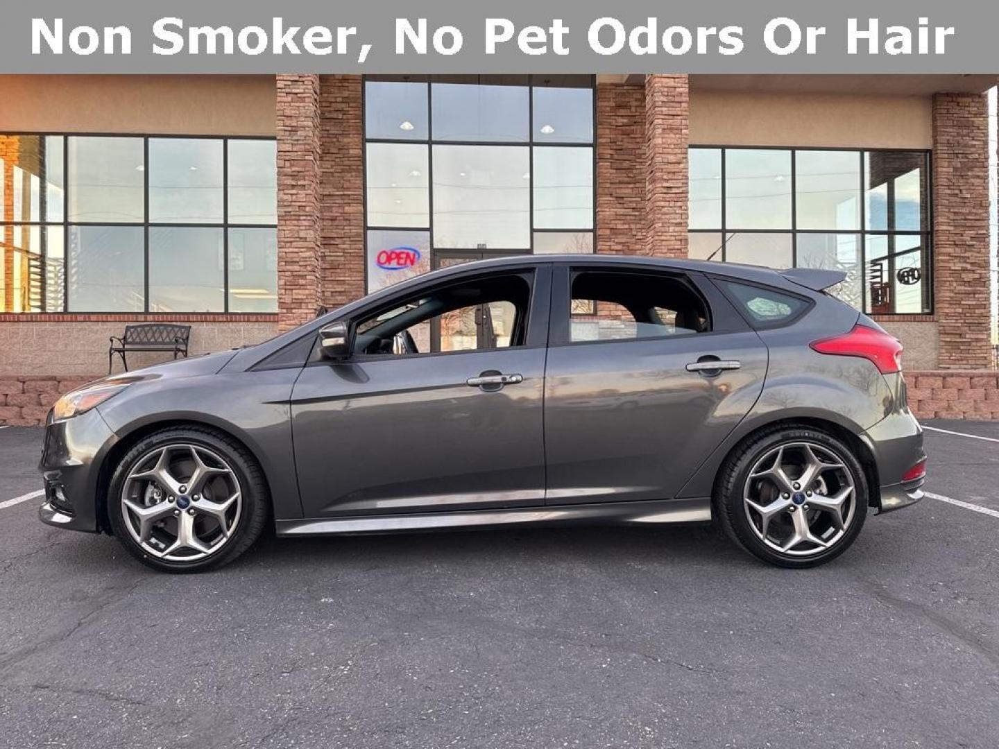 2016 GRAY Ford Focus ST (1FADP3L92GL) with an 4 Cyl, 2.0L engine, Manual transmission, located at 10890 W. Colfax Ave., Lakewood, CO, 80215, (303) 274-7692, 39.739914, -105.120132 - <b>Summary</b><br>Completley stock ST and zero signs of abuse. This is probaly the cleanest one in town. Fully serviced including new turbo and new tires. So much fun to drive! No Accidents and ready to go!<br><br><b>Vehicle Details</b><br>Discover the 2016 Ford Focus ST, a dynamic blend of performa - Photo#42