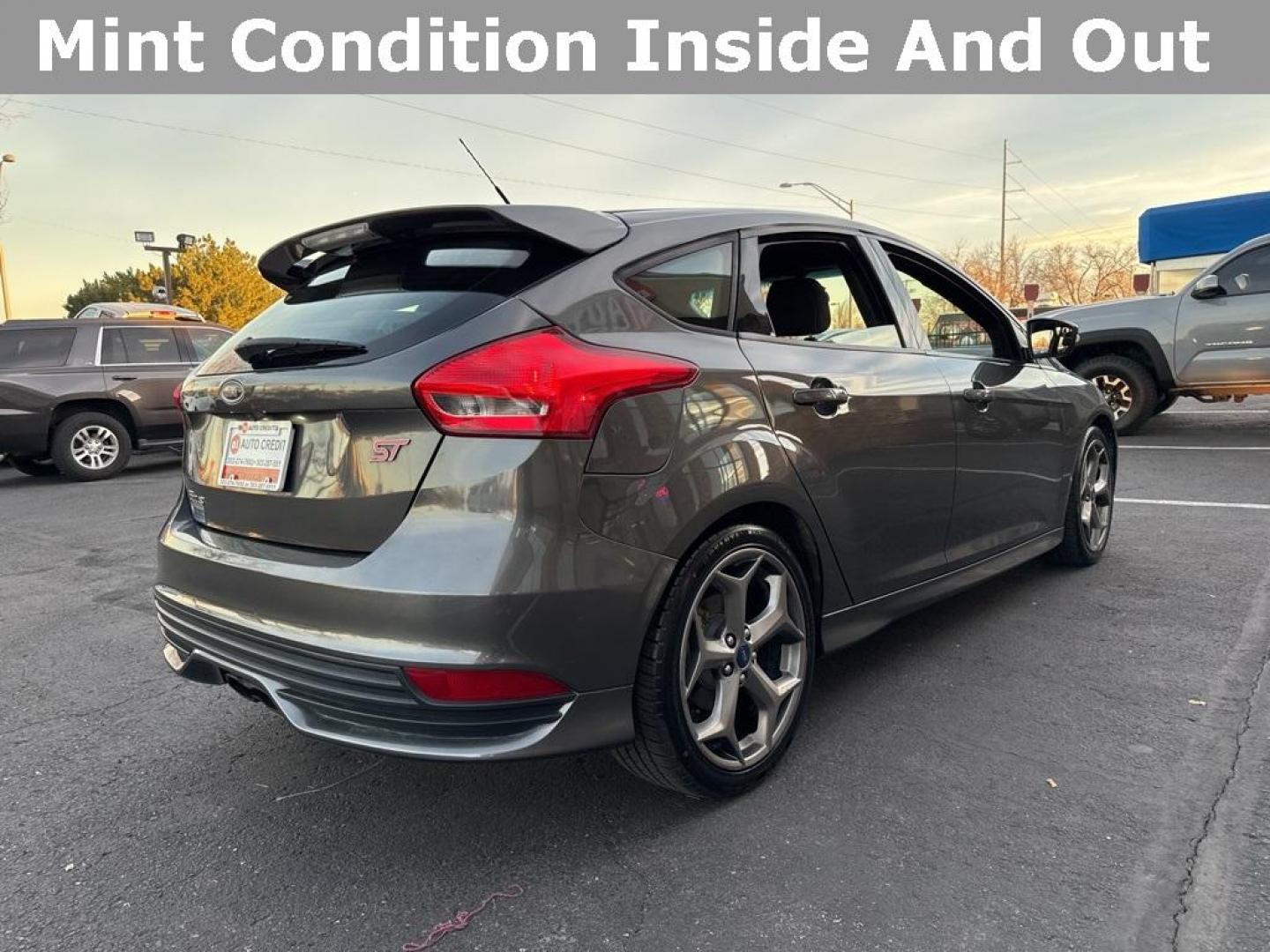 2016 GRAY Ford Focus ST (1FADP3L92GL) with an 4 Cyl, 2.0L engine, Manual transmission, located at 10890 W. Colfax Ave., Lakewood, CO, 80215, (303) 274-7692, 39.739914, -105.120132 - <b>Summary</b><br>Completley stock ST and zero signs of abuse. This is probaly the cleanest one in town. Fully serviced including new turbo and new tires. So much fun to drive! No Accidents and ready to go!<br><br><b>Vehicle Details</b><br>Discover the 2016 Ford Focus ST, a dynamic blend of performa - Photo#43