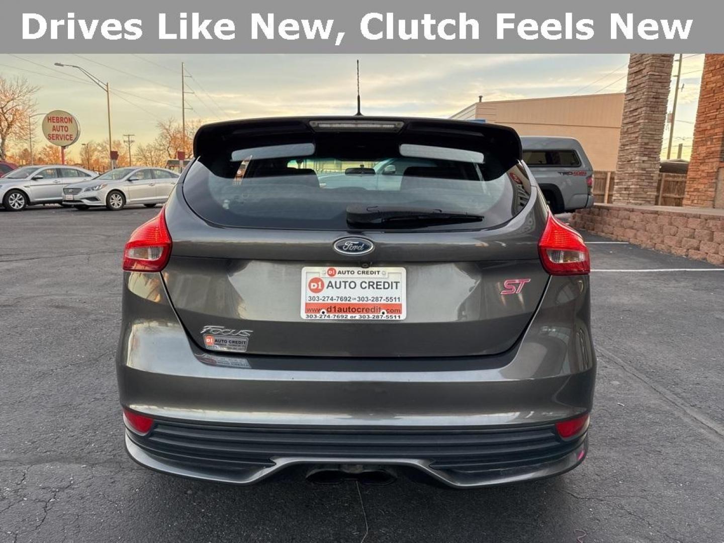 2016 GRAY Ford Focus ST (1FADP3L92GL) with an 4 Cyl, 2.0L engine, Manual transmission, located at 10890 W. Colfax Ave., Lakewood, CO, 80215, (303) 274-7692, 39.739914, -105.120132 - <b>Summary</b><br>Completley stock ST and zero signs of abuse. This is probaly the cleanest one in town. Fully serviced including new turbo and new tires. So much fun to drive! No Accidents and ready to go!<br><br><b>Vehicle Details</b><br>Discover the 2016 Ford Focus ST, a dynamic blend of performa - Photo#44