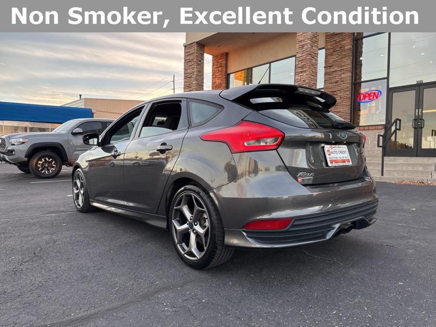 2016 GRAY Ford Focus ST (1FADP3L92GL) with an 4 Cyl, 2.0L engine, Manual transmission, located at 10890 W. Colfax Ave., Lakewood, CO, 80215, (303) 274-7692, 39.739914, -105.120132 - <b>Summary</b><br>Completley stock ST and zero signs of abuse. This is probaly the cleanest one in town. Fully serviced including new turbo and new tires. So much fun to drive! No Accidents and ready to go!<br><br><b>Vehicle Details</b><br>Discover the 2016 Ford Focus ST, a dynamic blend of performa - Photo#45