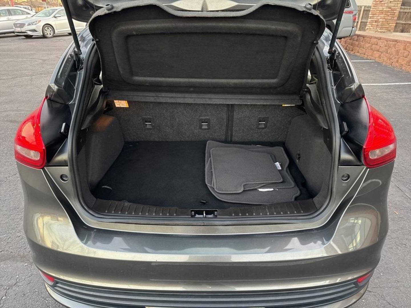 2016 GRAY Ford Focus ST (1FADP3L92GL) with an 4 Cyl, 2.0L engine, Manual transmission, located at 10890 W. Colfax Ave., Lakewood, CO, 80215, (303) 274-7692, 39.739914, -105.120132 - <b>Summary</b><br>Completley stock ST and zero signs of abuse. This is probaly the cleanest one in town. Fully serviced including new turbo and new tires. So much fun to drive! No Accidents and ready to go!<br><br><b>Vehicle Details</b><br>Discover the 2016 Ford Focus ST, a dynamic blend of performa - Photo#52
