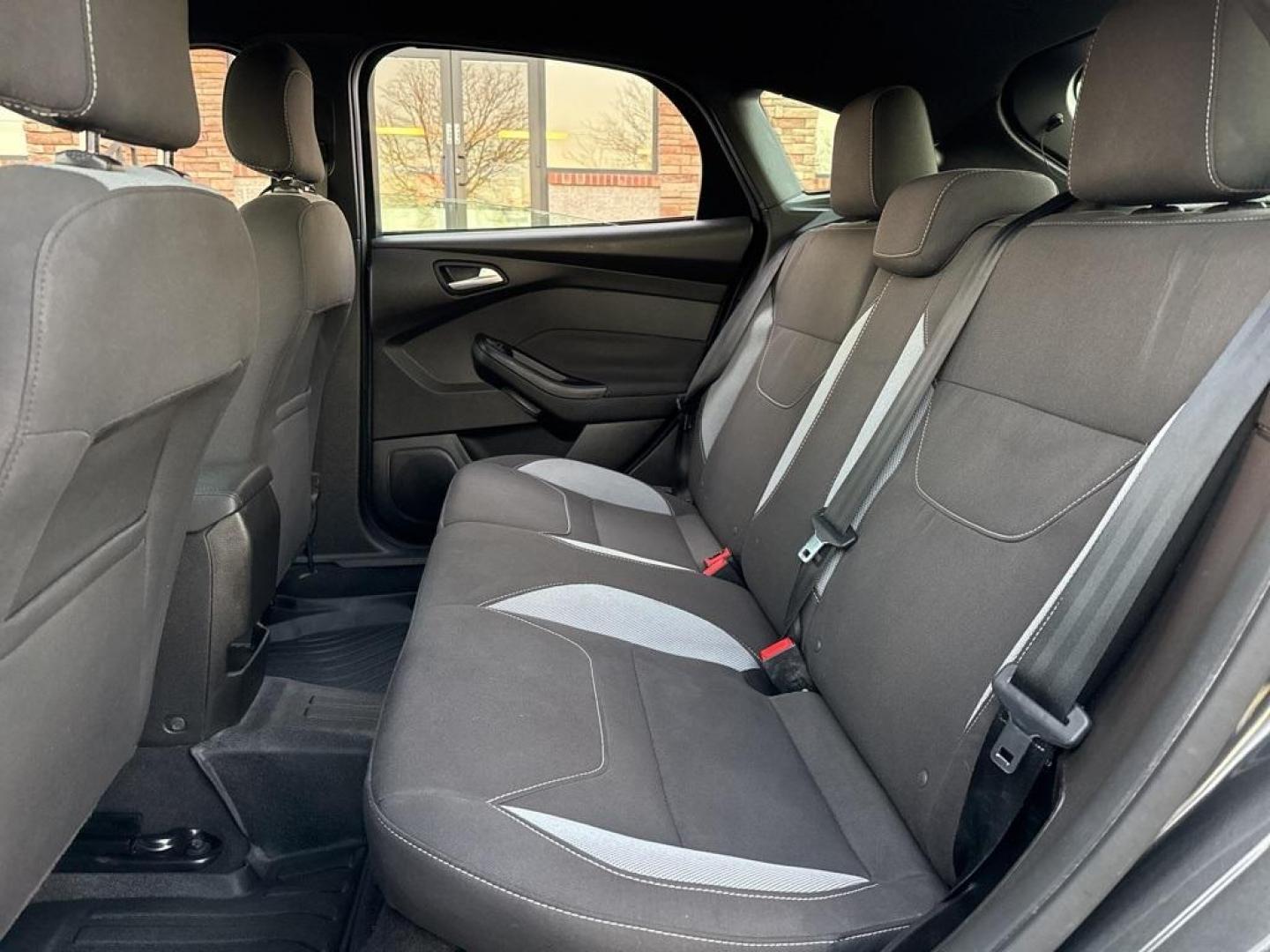 2016 GRAY Ford Focus ST (1FADP3L92GL) with an 4 Cyl, 2.0L engine, Manual transmission, located at 10890 W. Colfax Ave., Lakewood, CO, 80215, (303) 274-7692, 39.739914, -105.120132 - <b>Summary</b><br>Completley stock ST and zero signs of abuse. This is probaly the cleanest one in town. Fully serviced including new turbo and new tires. So much fun to drive! No Accidents and ready to go!<br><br><b>Vehicle Details</b><br>Discover the 2016 Ford Focus ST, a dynamic blend of performa - Photo#53
