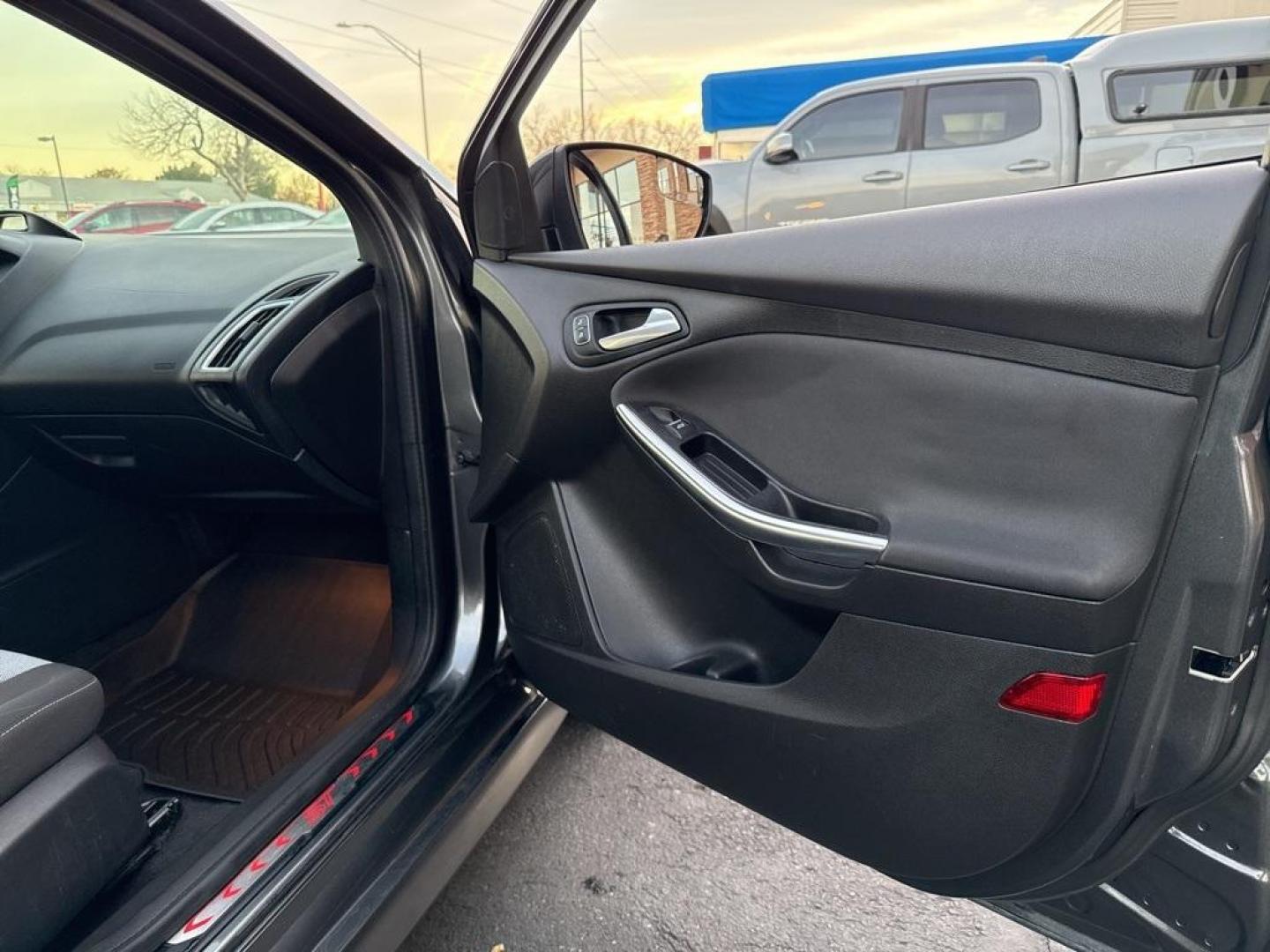 2016 GRAY Ford Focus ST (1FADP3L92GL) with an 4 Cyl, 2.0L engine, Manual transmission, located at 10890 W. Colfax Ave., Lakewood, CO, 80215, (303) 274-7692, 39.739914, -105.120132 - <b>Summary</b><br>Completley stock ST and zero signs of abuse. This is probaly the cleanest one in town. Fully serviced including new turbo and new tires. So much fun to drive! No Accidents and ready to go!<br><br><b>Vehicle Details</b><br>Discover the 2016 Ford Focus ST, a dynamic blend of performa - Photo#64