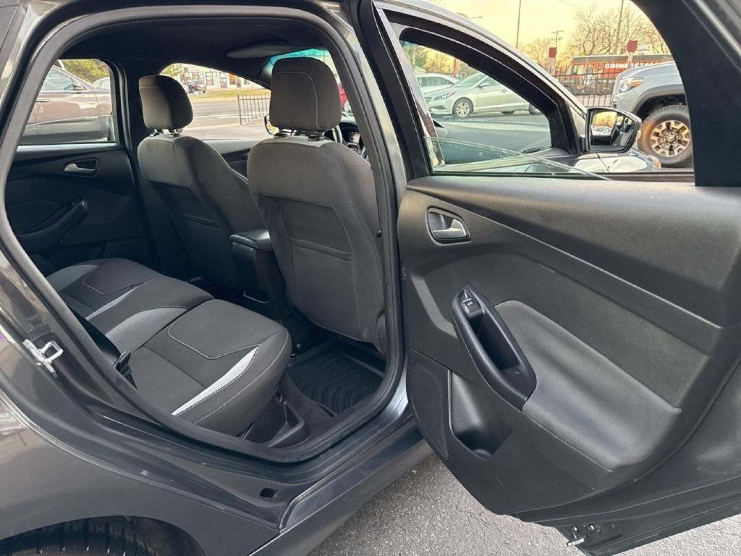 2016 GRAY Ford Focus ST (1FADP3L92GL) with an 4 Cyl, 2.0L engine, Manual transmission, located at 10890 W. Colfax Ave., Lakewood, CO, 80215, (303) 274-7692, 39.739914, -105.120132 - <b>Summary</b><br>Completley stock ST and zero signs of abuse. This is probaly the cleanest one in town. Fully serviced including new turbo and new tires. So much fun to drive! No Accidents and ready to go!<br><br><b>Vehicle Details</b><br>Discover the 2016 Ford Focus ST, a dynamic blend of performa - Photo#65