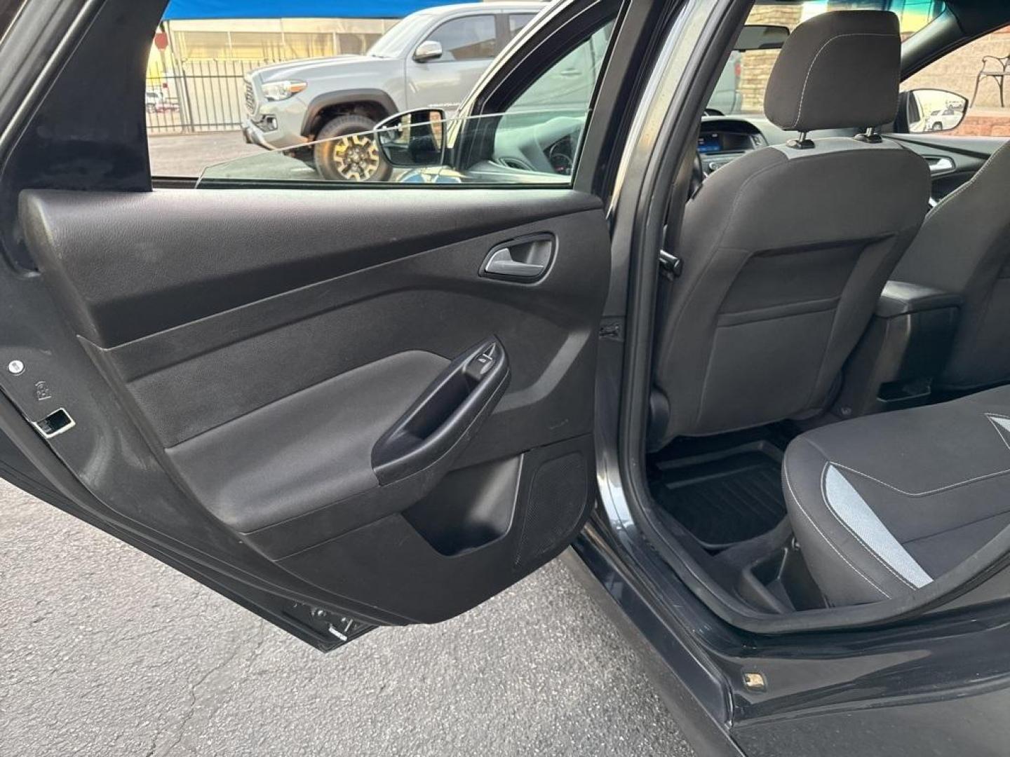 2016 GRAY Ford Focus ST (1FADP3L92GL) with an 4 Cyl, 2.0L engine, Manual transmission, located at 10890 W. Colfax Ave., Lakewood, CO, 80215, (303) 274-7692, 39.739914, -105.120132 - <b>Summary</b><br>Completley stock ST and zero signs of abuse. This is probaly the cleanest one in town. Fully serviced including new turbo and new tires. So much fun to drive! No Accidents and ready to go!<br><br><b>Vehicle Details</b><br>Discover the 2016 Ford Focus ST, a dynamic blend of performa - Photo#66