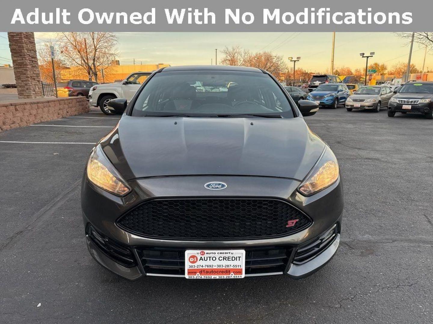 2016 GRAY Ford Focus ST (1FADP3L92GL) with an 4 Cyl, 2.0L engine, Manual transmission, located at 10890 W. Colfax Ave., Lakewood, CO, 80215, (303) 274-7692, 39.739914, -105.120132 - <b>Summary</b><br>Completley stock ST and zero signs of abuse. This is probaly the cleanest one in town. Fully serviced including new turbo and new tires. So much fun to drive! No Accidents and ready to go!<br><br><b>Vehicle Details</b><br>Discover the 2016 Ford Focus ST, a dynamic blend of performa - Photo#1