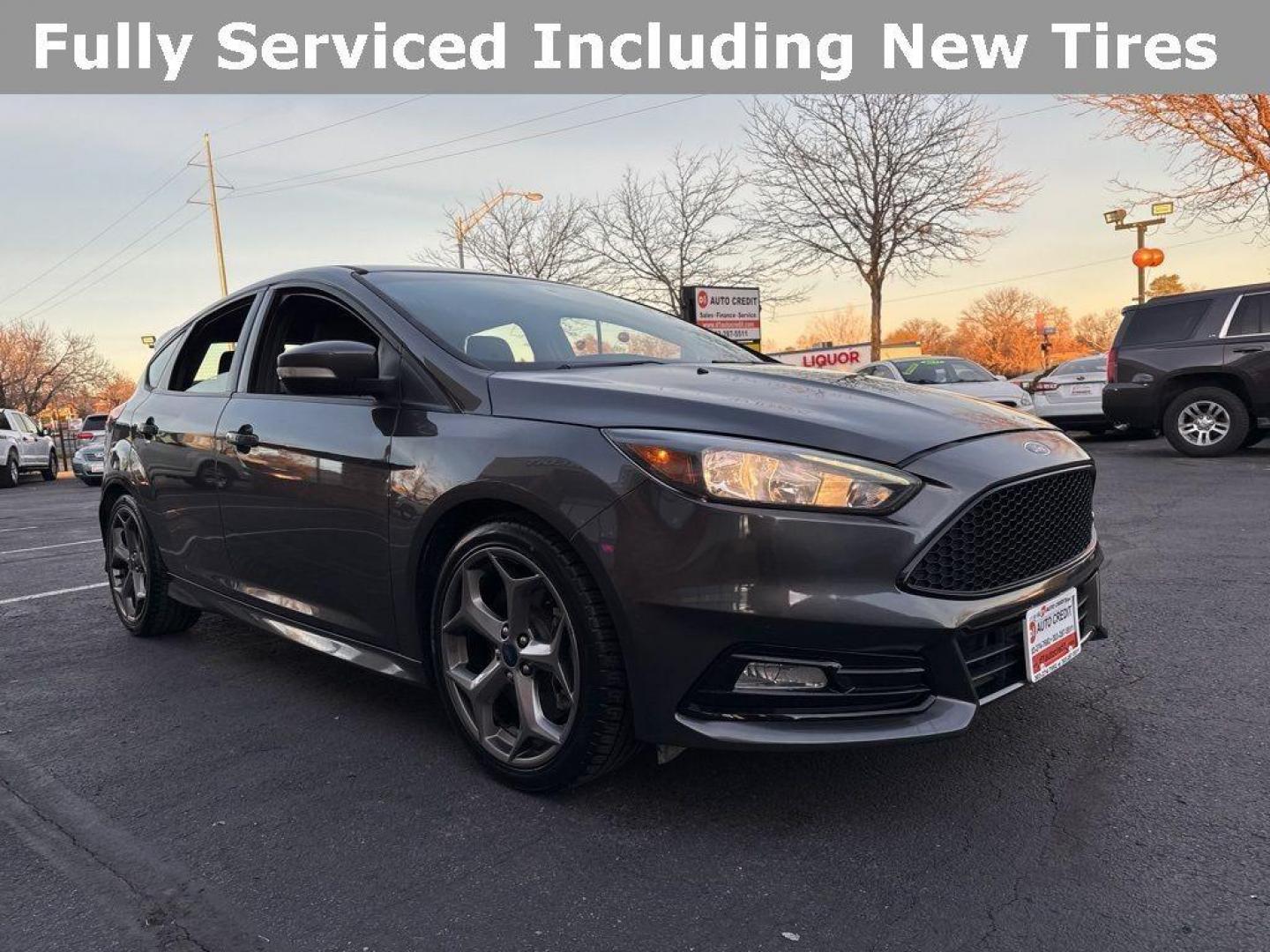 2016 GRAY Ford Focus ST (1FADP3L92GL) with an 4 Cyl, 2.0L engine, Manual transmission, located at 10890 W. Colfax Ave., Lakewood, CO, 80215, (303) 274-7692, 39.739914, -105.120132 - <b>Summary</b><br>Completley stock ST and zero signs of abuse. This is probaly the cleanest one in town. Fully serviced including new turbo and new tires. So much fun to drive! No Accidents and ready to go!<br><br><b>Vehicle Details</b><br>Discover the 2016 Ford Focus ST, a dynamic blend of performa - Photo#2