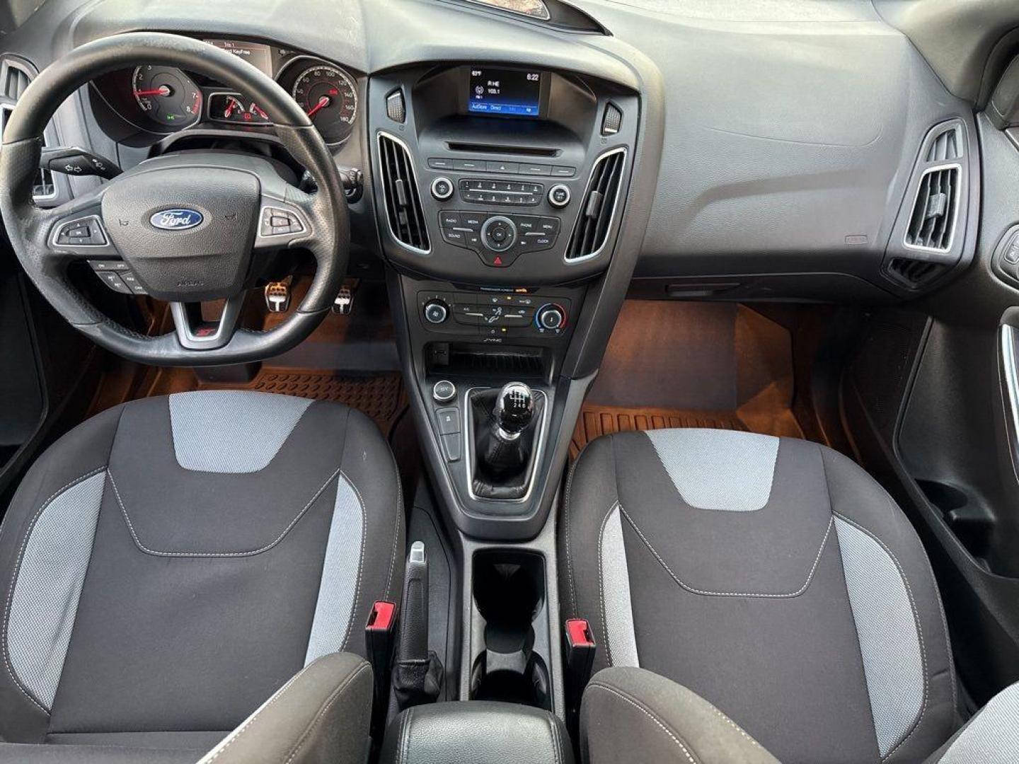 2016 GRAY Ford Focus ST (1FADP3L92GL) with an 4 Cyl, 2.0L engine, Manual transmission, located at 10890 W. Colfax Ave., Lakewood, CO, 80215, (303) 274-7692, 39.739914, -105.120132 - <b>Summary</b><br>Completley stock ST and zero signs of abuse. This is probaly the cleanest one in town. Fully serviced including new turbo and new tires. So much fun to drive! No Accidents and ready to go!<br><br><b>Vehicle Details</b><br>Discover the 2016 Ford Focus ST, a dynamic blend of performa - Photo#8