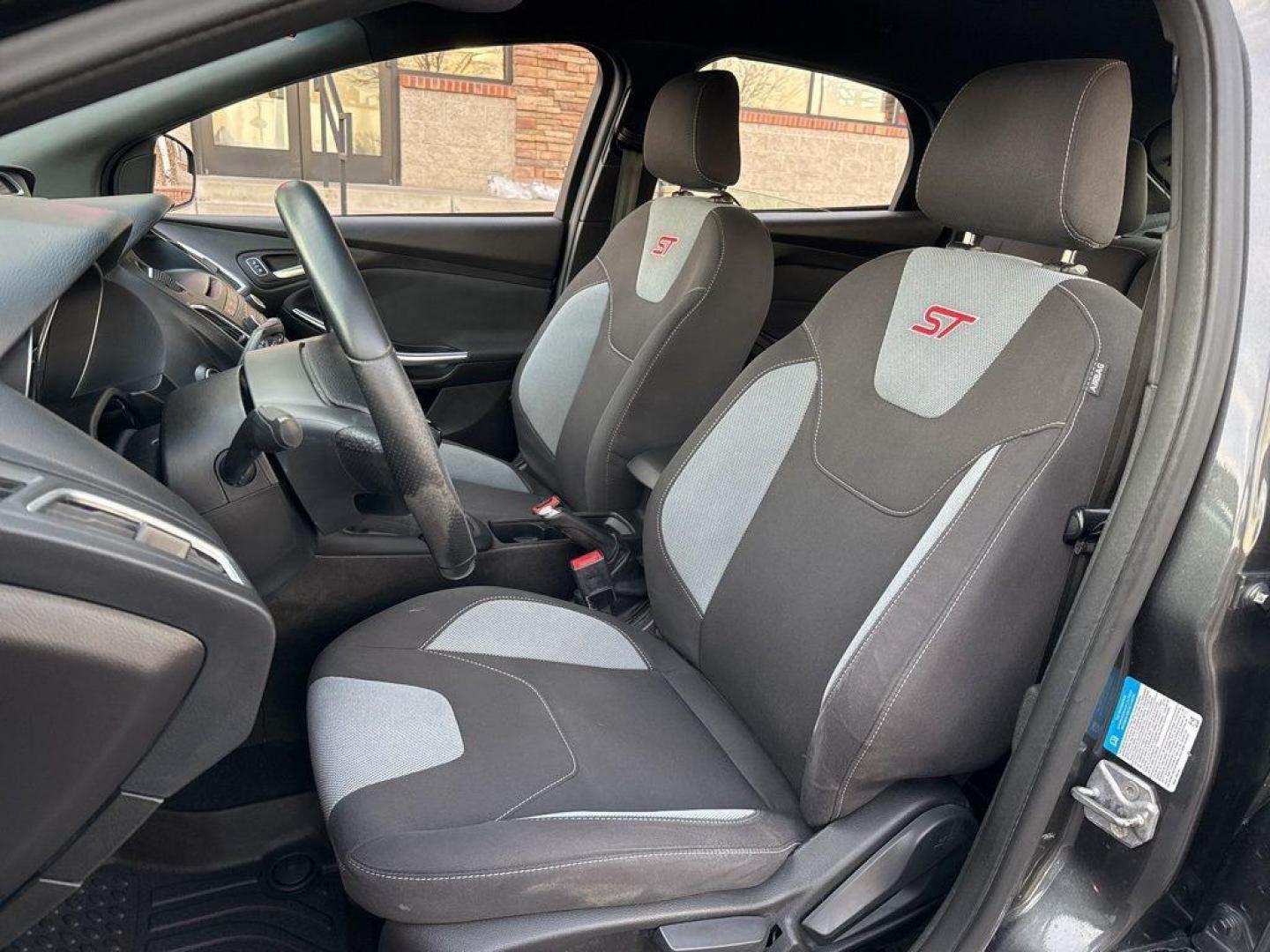 2016 GRAY Ford Focus ST (1FADP3L92GL) with an 4 Cyl, 2.0L engine, Manual transmission, located at 10890 W. Colfax Ave., Lakewood, CO, 80215, (303) 274-7692, 39.739914, -105.120132 - <b>Summary</b><br>Completley stock ST and zero signs of abuse. This is probaly the cleanest one in town. Fully serviced including new turbo and new tires. So much fun to drive! No Accidents and ready to go!<br><br><b>Vehicle Details</b><br>Discover the 2016 Ford Focus ST, a dynamic blend of performa - Photo#11