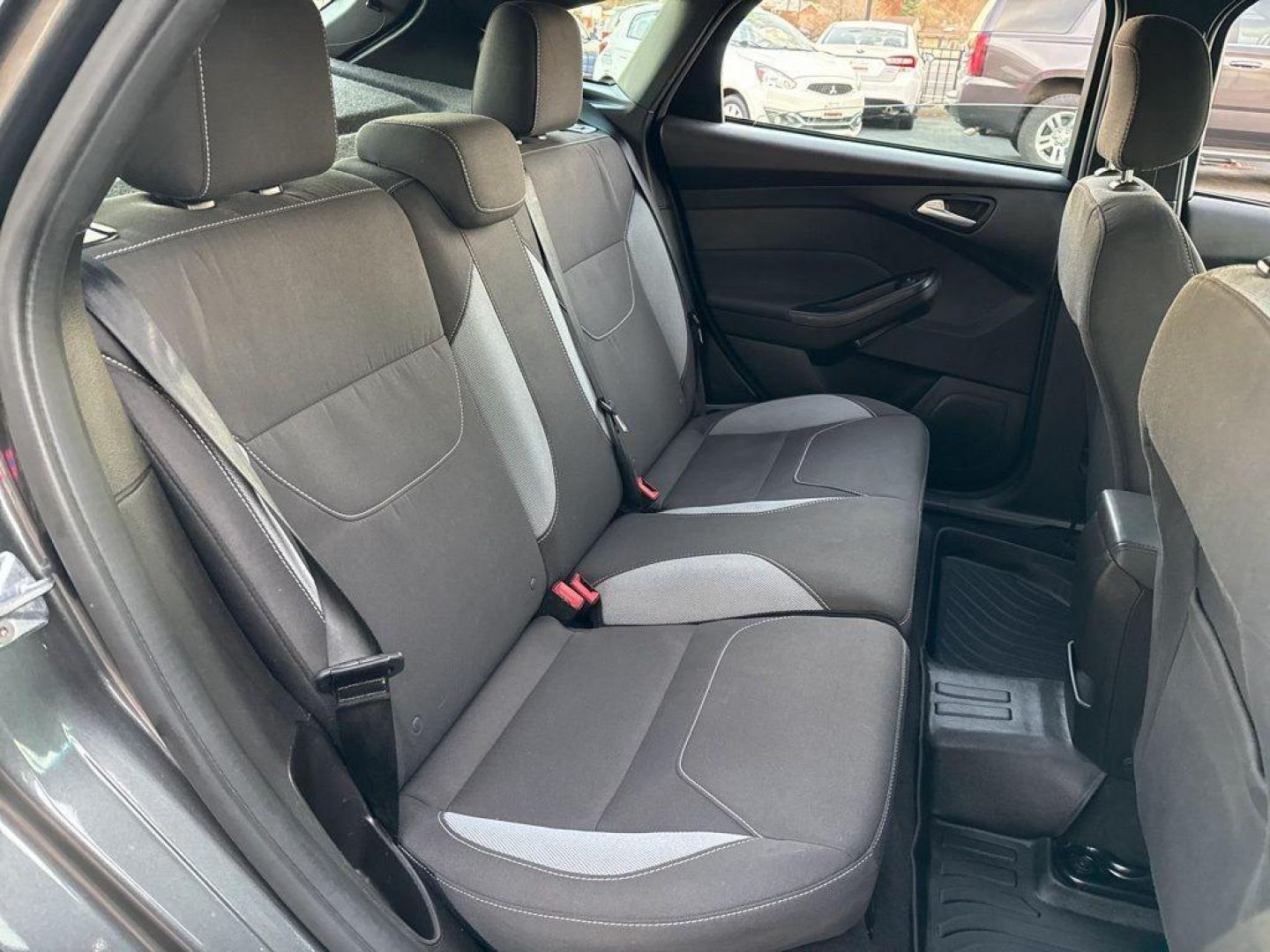 2016 GRAY Ford Focus ST (1FADP3L92GL) with an 4 Cyl, 2.0L engine, Manual transmission, located at 10890 W. Colfax Ave., Lakewood, CO, 80215, (303) 274-7692, 39.739914, -105.120132 - <b>Summary</b><br>Completley stock ST and zero signs of abuse. This is probaly the cleanest one in town. Fully serviced including new turbo and new tires. So much fun to drive! No Accidents and ready to go!<br><br><b>Vehicle Details</b><br>Discover the 2016 Ford Focus ST, a dynamic blend of performa - Photo#13