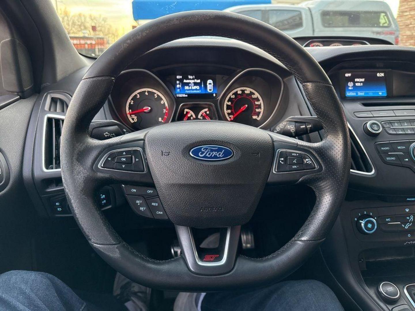 2016 GRAY Ford Focus ST (1FADP3L92GL) with an 4 Cyl, 2.0L engine, Manual transmission, located at 10890 W. Colfax Ave., Lakewood, CO, 80215, (303) 274-7692, 39.739914, -105.120132 - <b>Summary</b><br>Completley stock ST and zero signs of abuse. This is probaly the cleanest one in town. Fully serviced including new turbo and new tires. So much fun to drive! No Accidents and ready to go!<br><br><b>Vehicle Details</b><br>Discover the 2016 Ford Focus ST, a dynamic blend of performa - Photo#18