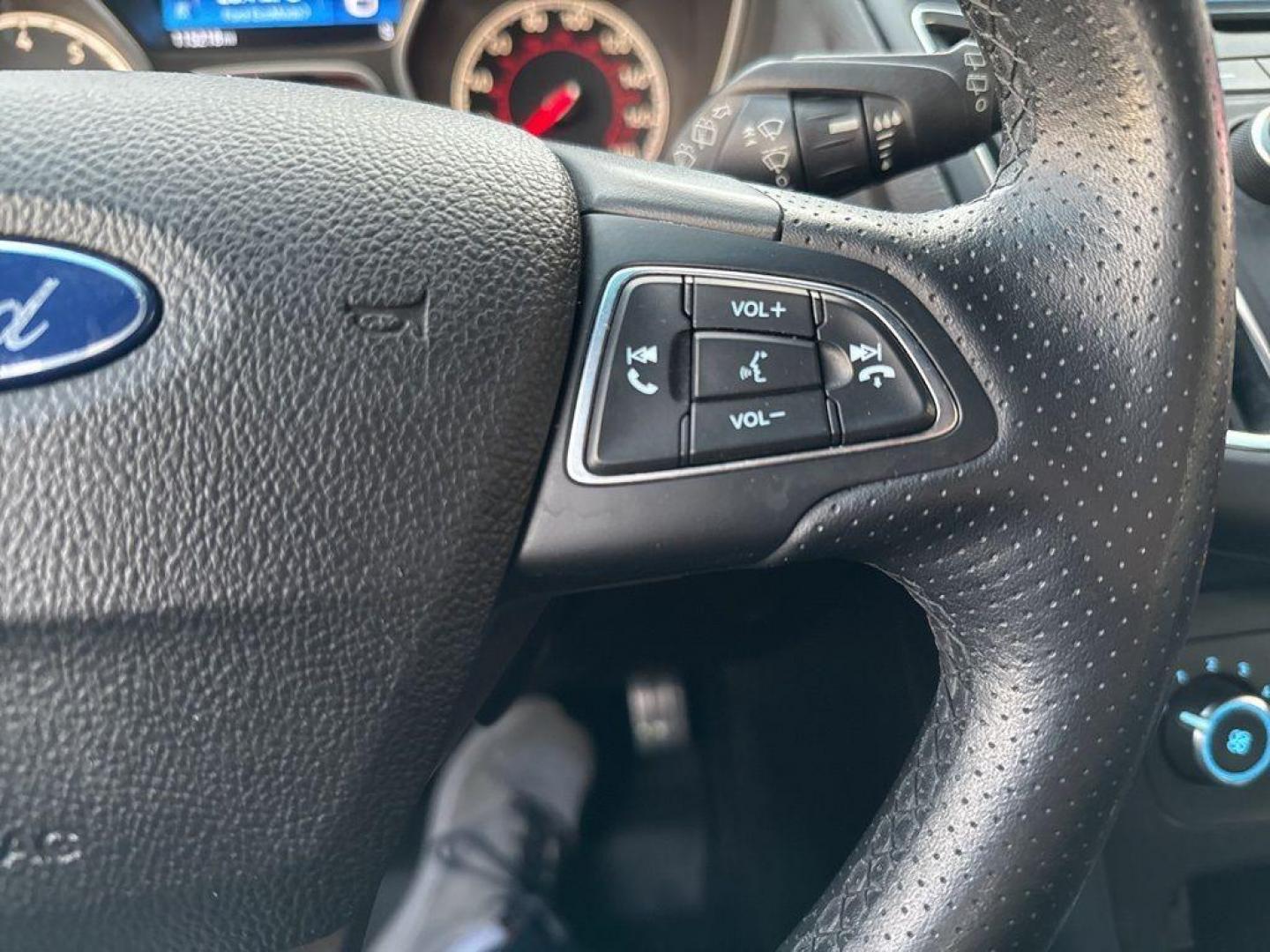 2016 GRAY Ford Focus ST (1FADP3L92GL) with an 4 Cyl, 2.0L engine, Manual transmission, located at 10890 W. Colfax Ave., Lakewood, CO, 80215, (303) 274-7692, 39.739914, -105.120132 - <b>Summary</b><br>Completley stock ST and zero signs of abuse. This is probaly the cleanest one in town. Fully serviced including new turbo and new tires. So much fun to drive! No Accidents and ready to go!<br><br><b>Vehicle Details</b><br>Discover the 2016 Ford Focus ST, a dynamic blend of performa - Photo#20