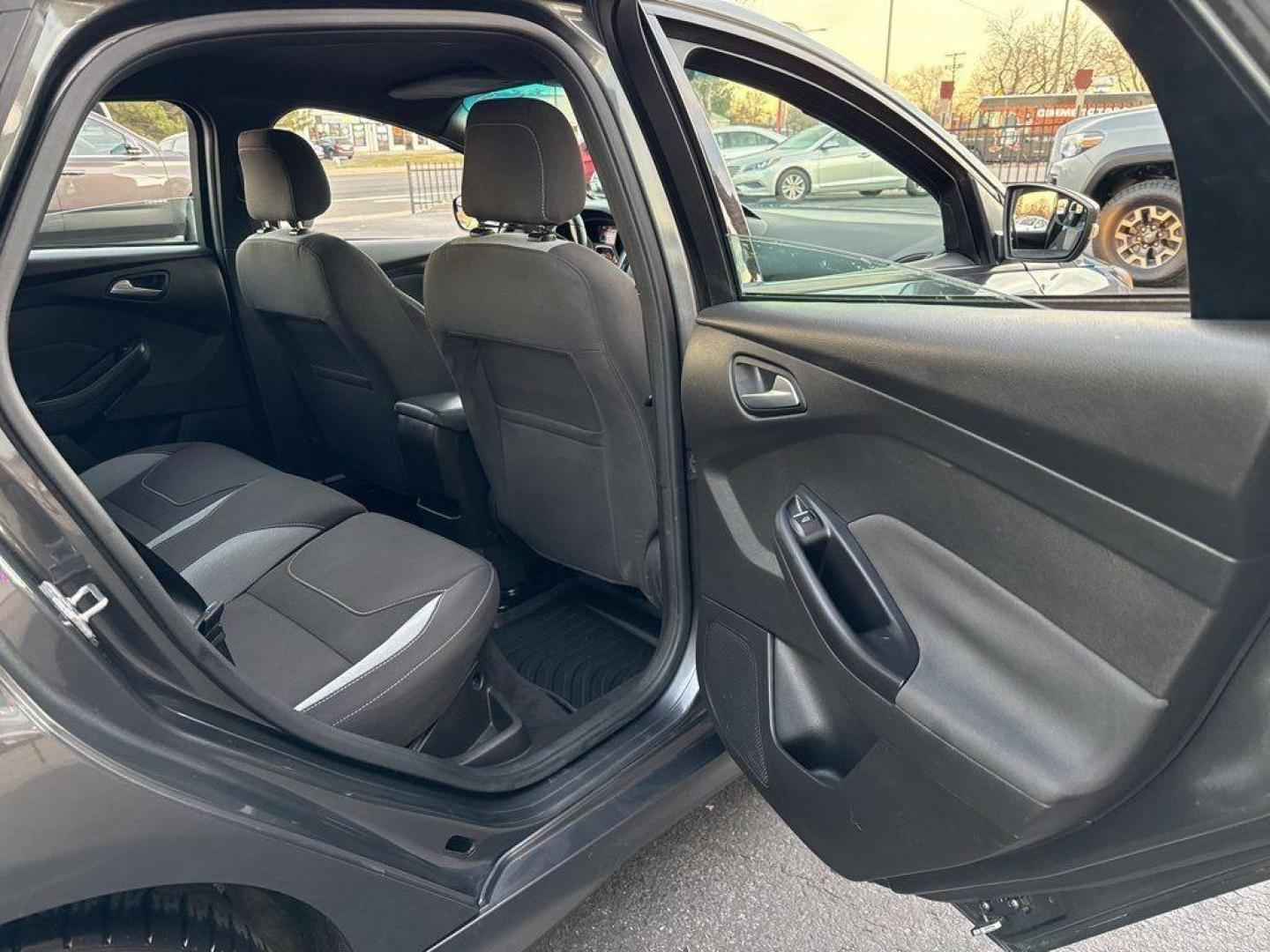 2016 GRAY Ford Focus ST (1FADP3L92GL) with an 4 Cyl, 2.0L engine, Manual transmission, located at 10890 W. Colfax Ave., Lakewood, CO, 80215, (303) 274-7692, 39.739914, -105.120132 - <b>Summary</b><br>Completley stock ST and zero signs of abuse. This is probaly the cleanest one in town. Fully serviced including new turbo and new tires. So much fun to drive! No Accidents and ready to go!<br><br><b>Vehicle Details</b><br>Discover the 2016 Ford Focus ST, a dynamic blend of performa - Photo#27