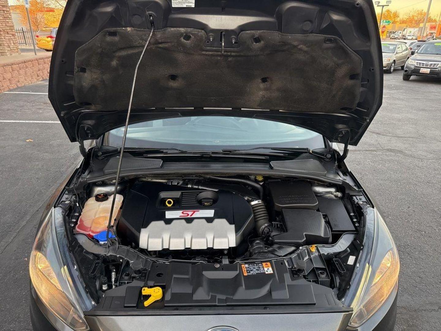 2016 GRAY Ford Focus ST (1FADP3L92GL) with an 4 Cyl, 2.0L engine, Manual transmission, located at 10890 W. Colfax Ave., Lakewood, CO, 80215, (303) 274-7692, 39.739914, -105.120132 - <b>Summary</b><br>Completley stock ST and zero signs of abuse. This is probaly the cleanest one in town. Fully serviced including new turbo and new tires. So much fun to drive! No Accidents and ready to go!<br><br><b>Vehicle Details</b><br>Discover the 2016 Ford Focus ST, a dynamic blend of performa - Photo#36