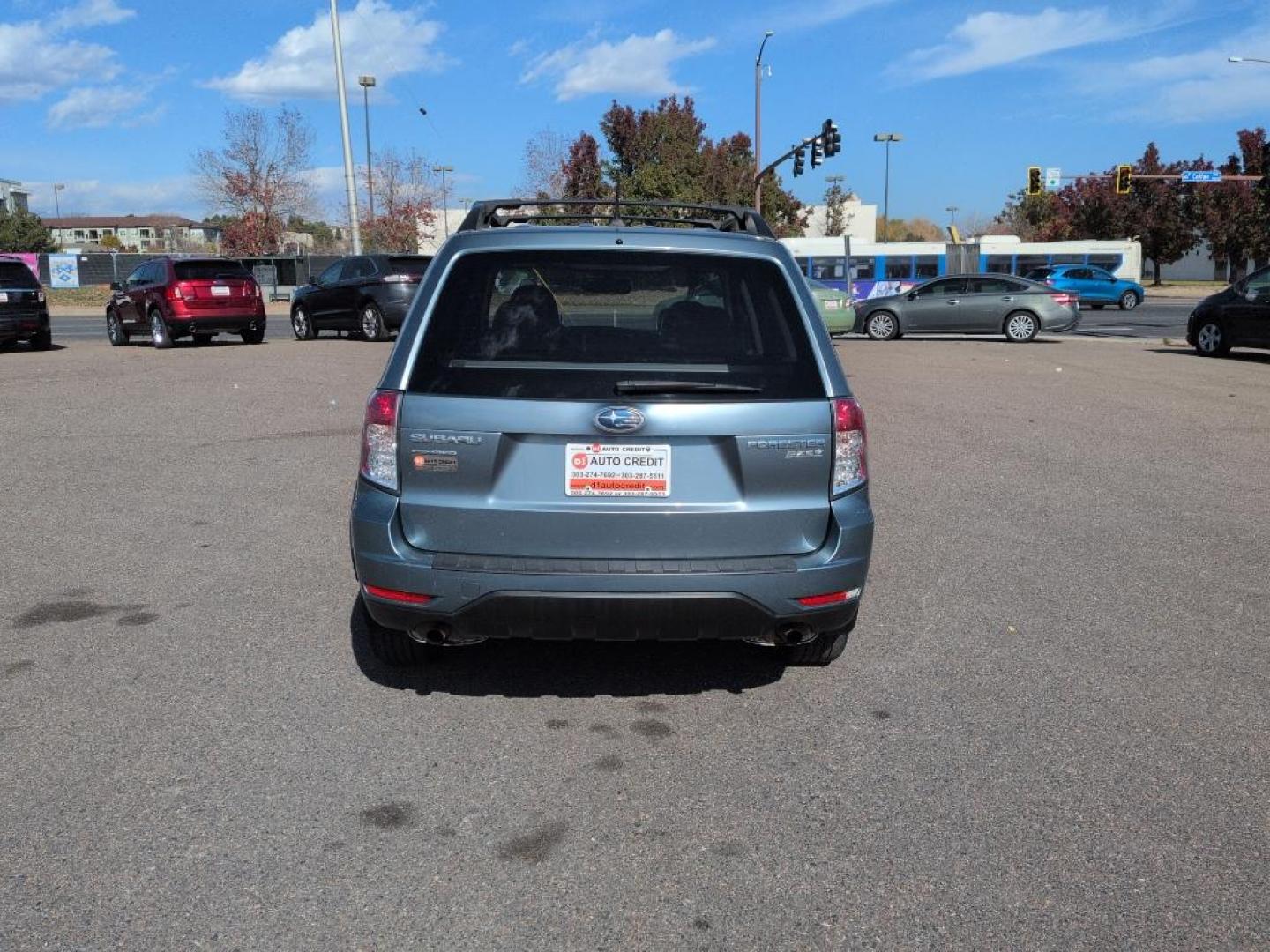 2011 GREEN Subaru Forester 2.5X Premium AWP (JF2SHADC4BH) with an 4 Cyl, 2.5L engine, Automatic transmission, located at 10890 W. Colfax Ave., Lakewood, CO, 80215, (303) 274-7692, 39.739914, -105.120132 - Photo#5