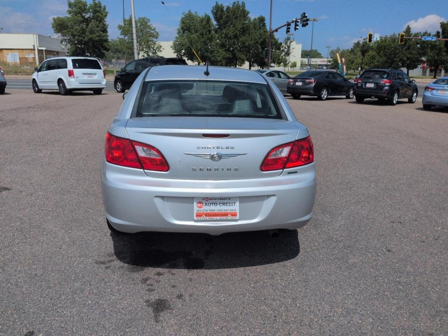 2010 SILVER Chrysler Sebring Limited (1C3CC5FB5AN) with an 4 Cyl, 2.4L engine, Automatic transmission, located at 10890 W. Colfax Ave., Lakewood, CO, 80215, (303) 274-7692, 39.739914, -105.120132 - Photo#5
