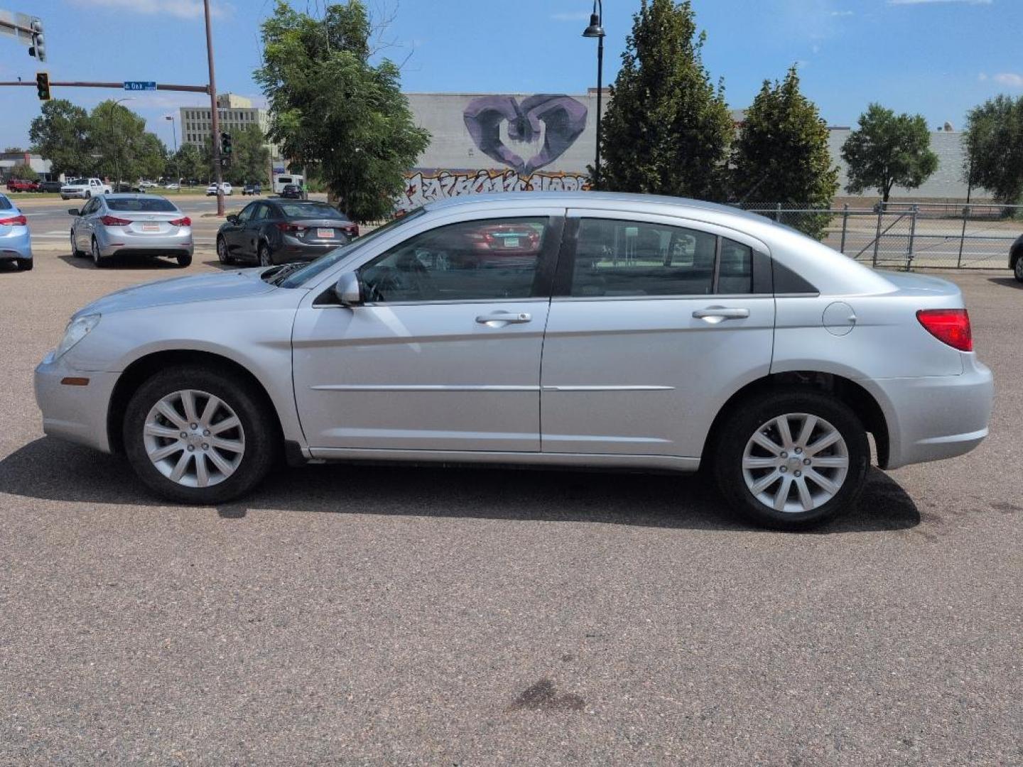 2010 SILVER Chrysler Sebring Limited (1C3CC5FB5AN) with an 4 Cyl, 2.4L engine, Automatic transmission, located at 10890 W. Colfax Ave., Lakewood, CO, 80215, (303) 274-7692, 39.739914, -105.120132 - Photo#7