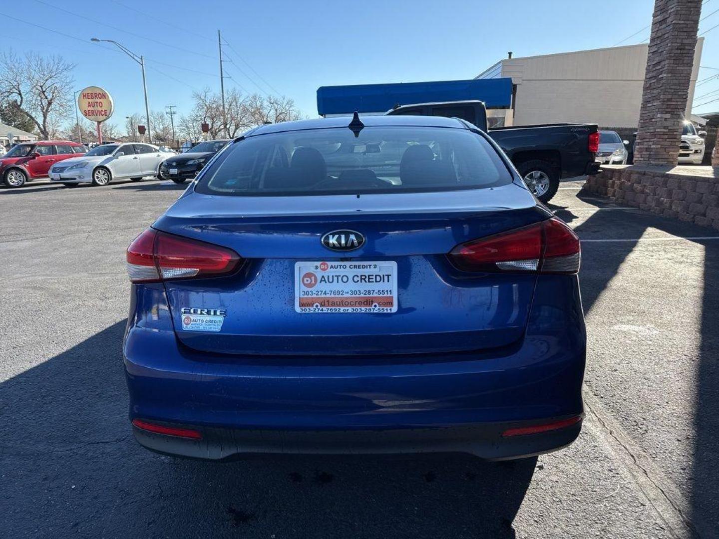 2017 BLUE Kia Forte LX 6A (3KPFL4A71HE) with an 4 Cyl, 2.0L engine, Automatic transmission, located at 10890 W. Colfax Ave., Lakewood, CO, 80215, (303) 274-7692, 39.739914, -105.120132 - Discover exceptional value and reliability with this 2017 Kia Forte LX 6A, now available at our dealership. This well-maintained sedan offers everything you need for a comfortable and efficient driving experience. Equipped with a robust 4-cylinder, 2.0L engine, and smooth 6-speed automatic transmiss - Photo#5