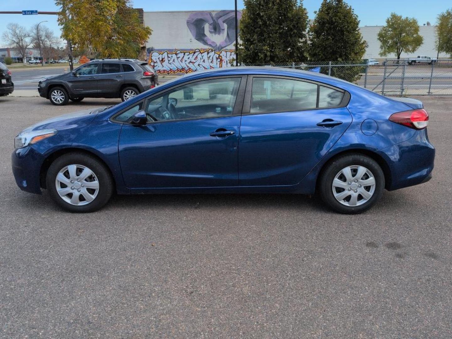 2017 BLUE Kia Forte LX 6A (3KPFL4A71HE) with an 4 Cyl, 2.0L engine, Automatic transmission, located at 10890 W. Colfax Ave., Lakewood, CO, 80215, (303) 274-7692, 39.739914, -105.120132 - Discover exceptional value and reliability with this 2017 Kia Forte LX 6A, now available at our dealership. This well-maintained sedan offers everything you need for a comfortable and efficient driving experience. Equipped with a robust 4-cylinder, 2.0L engine, and smooth 6-speed automatic transmiss - Photo#7