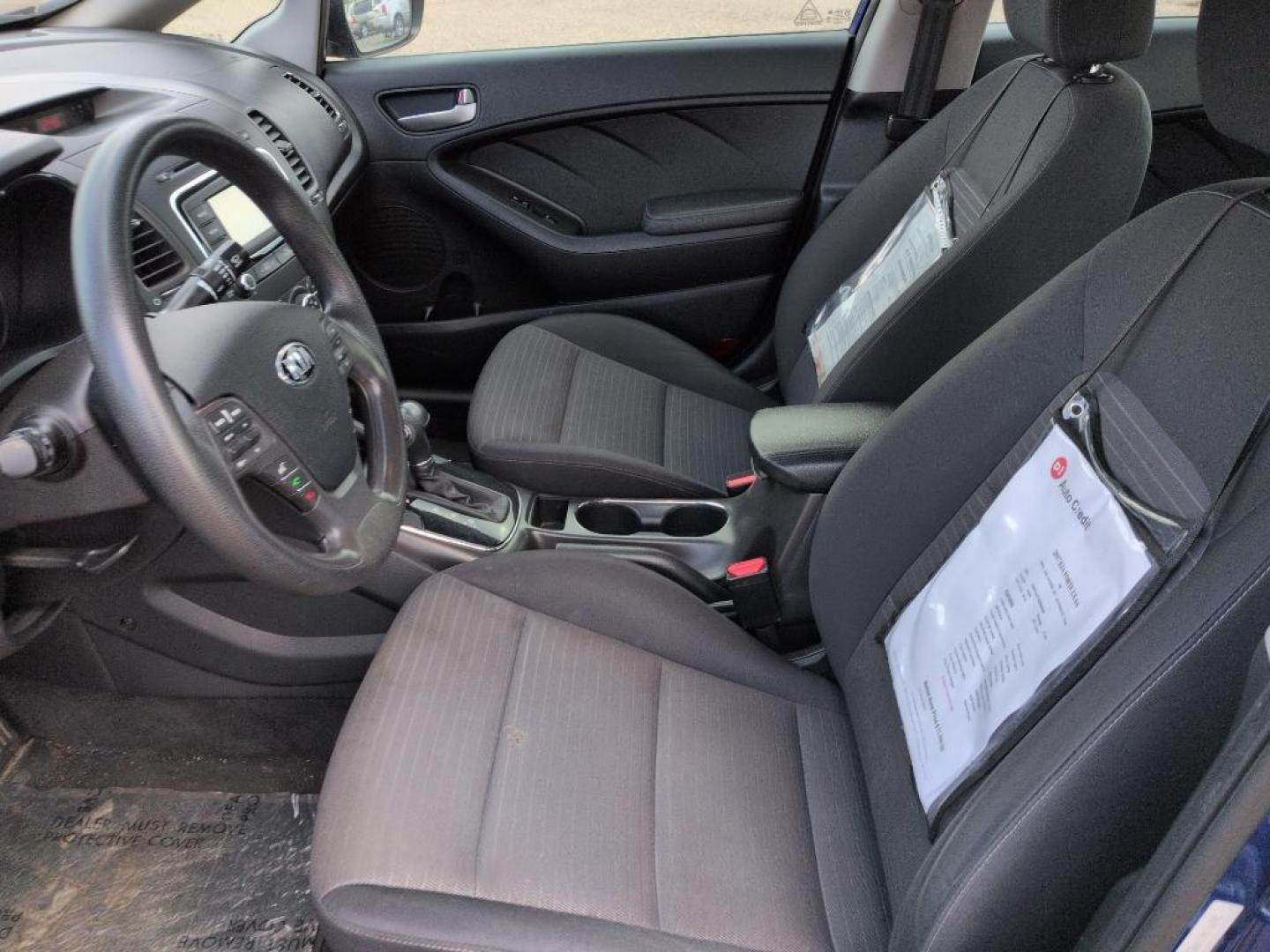 2017 BLUE Kia Forte LX 6A (3KPFL4A71HE) with an 4 Cyl, 2.0L engine, Automatic transmission, located at 10890 W. Colfax Ave., Lakewood, CO, 80215, (303) 274-7692, 39.739914, -105.120132 - Discover exceptional value and reliability with this 2017 Kia Forte LX 6A, now available at our dealership. This well-maintained sedan offers everything you need for a comfortable and efficient driving experience. Equipped with a robust 4-cylinder, 2.0L engine, and smooth 6-speed automatic transmiss - Photo#9