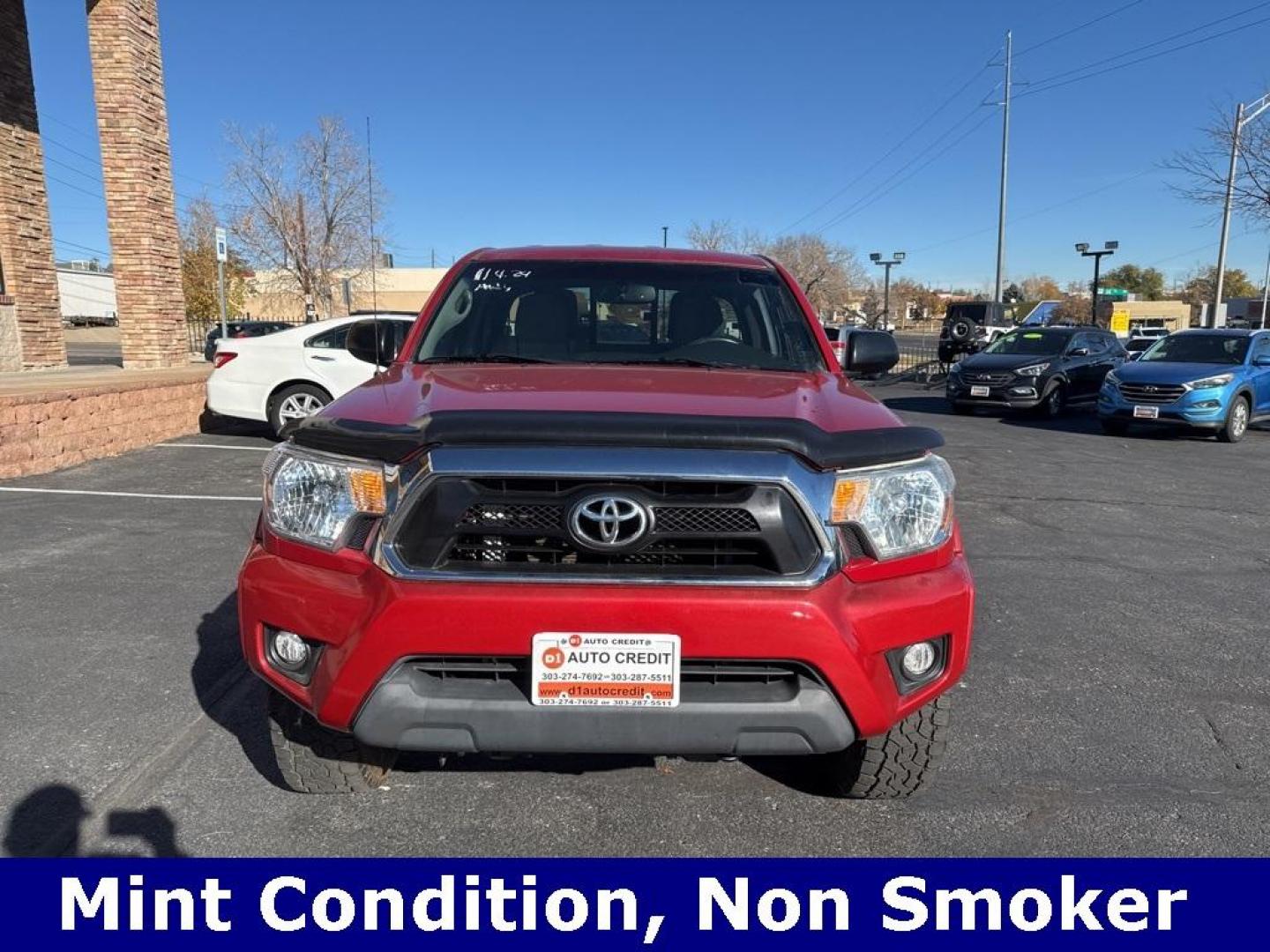 2012 Barcelona Red Metallic /Graphite Toyota Tacoma SR5 (5TFUX4EN6CX) with an 2.7L I4 DOHC 16V engine, Manual transmission, located at 10890 W. Colfax Ave., Lakewood, CO, 80215, (303) 274-7692, 39.739914, -105.120132 - 2012 Toyota Tacoma 4x4, manual transmission, 4cyl that is a 9.7 out of 10 condition wise. Non smoker, no rust and nicely equipped with SR5 package. You will not find a nicer one anywhere. <br><br>All Cars Have Clean Titles And Are Serviced Before Sale., Backup Camera, Non Smoker, No Pet Odor Or Hair - Photo#1