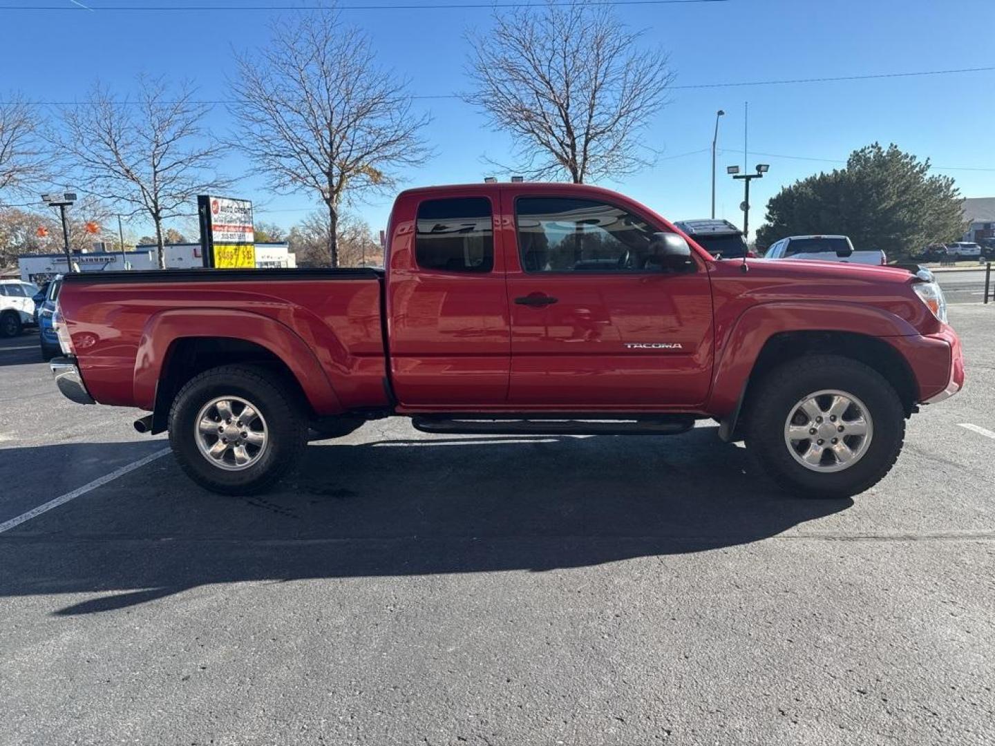 2012 Barcelona Red Metallic /Graphite Toyota Tacoma SR5 (5TFUX4EN6CX) with an 2.7L I4 DOHC 16V engine, Manual transmission, located at 10890 W. Colfax Ave., Lakewood, CO, 80215, (303) 274-7692, 39.739914, -105.120132 - 2012 Toyota Tacoma 4x4, manual transmission, 4cyl that is a 9.7 out of 10 condition wise. Non smoker, no rust and nicely equipped with SR5 package. You will not find a nicer one anywhere. <br><br>All Cars Have Clean Titles And Are Serviced Before Sale., Backup Camera, Non Smoker, No Pet Odor Or Hair - Photo#3
