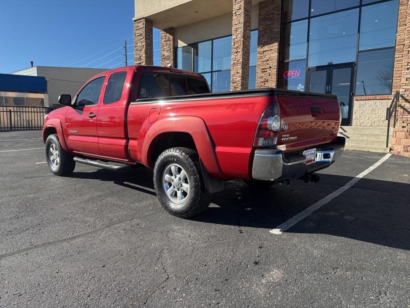 2012 Barcelona Red Metallic /Graphite Toyota Tacoma SR5 (5TFUX4EN6CX) with an 2.7L I4 DOHC 16V engine, Manual transmission, located at 10890 W. Colfax Ave., Lakewood, CO, 80215, (303) 274-7692, 39.739914, -105.120132 - 2012 Toyota Tacoma 4x4, manual transmission, 4cyl that is a 9.7 out of 10 condition wise. Non smoker, no rust and nicely equipped with SR5 package. You will not find a nicer one anywhere. <br><br>All Cars Have Clean Titles And Are Serviced Before Sale., Backup Camera, Non Smoker, No Pet Odor Or Hair - Photo#6