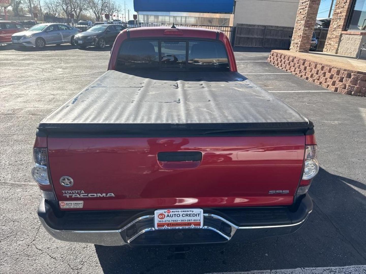 2012 Barcelona Red Metallic /Graphite Toyota Tacoma SR5 (5TFUX4EN6CX) with an 2.7L I4 DOHC 16V engine, Manual transmission, located at 10890 W. Colfax Ave., Lakewood, CO, 80215, (303) 274-7692, 39.739914, -105.120132 - 2012 Toyota Tacoma 4x4, manual transmission, 4cyl that is a 9.7 out of 10 condition wise. Non smoker, no rust and nicely equipped with SR5 package. You will not find a nicer one anywhere. <br><br>All Cars Have Clean Titles And Are Serviced Before Sale., Backup Camera, Non Smoker, No Pet Odor Or Hair - Photo#7