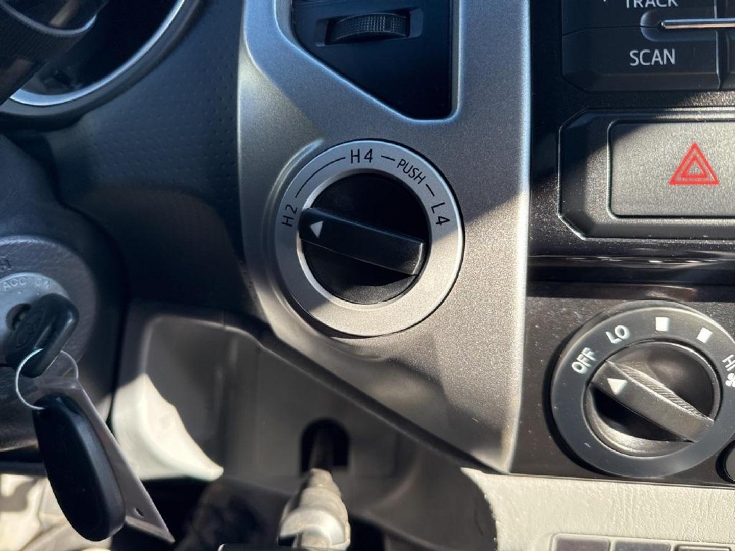 2012 Barcelona Red Metallic /Graphite Toyota Tacoma SR5 (5TFUX4EN6CX) with an 2.7L I4 DOHC 16V engine, Manual transmission, located at 10890 W. Colfax Ave., Lakewood, CO, 80215, (303) 274-7692, 39.739914, -105.120132 - 2012 Toyota Tacoma 4x4, manual transmission, 4cyl that is a 9.7 out of 10 condition wise. Non smoker, no rust and nicely equipped with SR5 package. You will not find a nicer one anywhere. <br><br>All Cars Have Clean Titles And Are Serviced Before Sale., Backup Camera, Non Smoker, No Pet Odor Or Hair - Photo#10