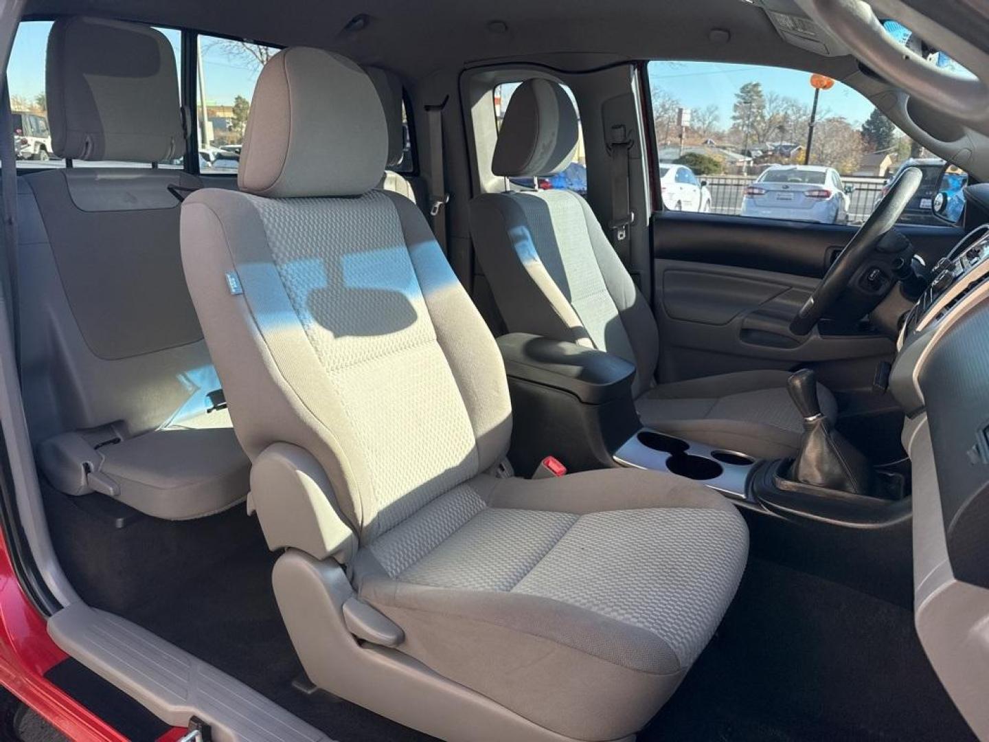 2012 Barcelona Red Metallic /Graphite Toyota Tacoma SR5 (5TFUX4EN6CX) with an 2.7L I4 DOHC 16V engine, Manual transmission, located at 10890 W. Colfax Ave., Lakewood, CO, 80215, (303) 274-7692, 39.739914, -105.120132 - 2012 Toyota Tacoma 4x4, manual transmission, 4cyl that is a 9.7 out of 10 condition wise. Non smoker, no rust and nicely equipped with SR5 package. You will not find a nicer one anywhere. <br><br>All Cars Have Clean Titles And Are Serviced Before Sale., Backup Camera, Non Smoker, No Pet Odor Or Hair - Photo#13