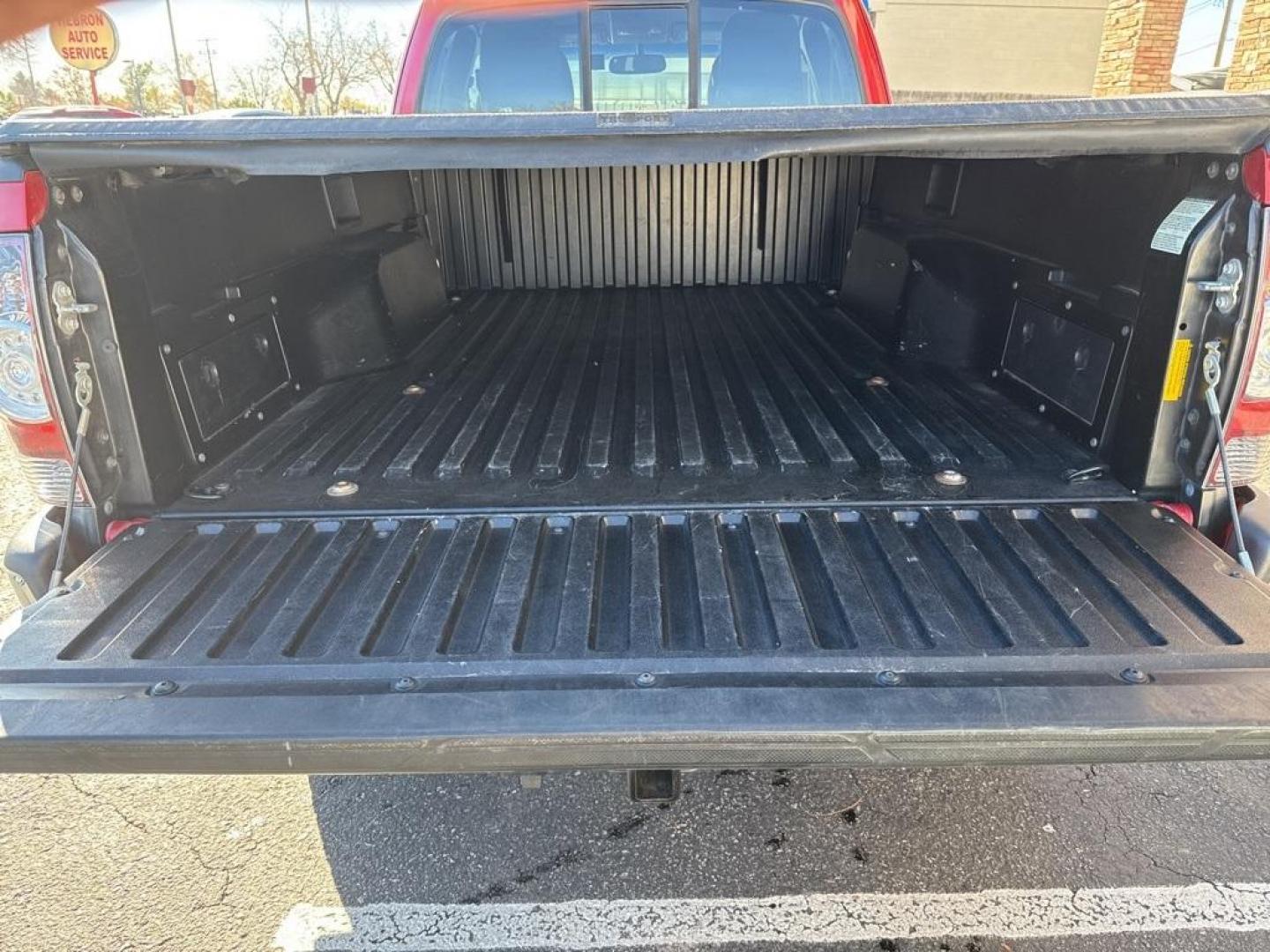 2012 Barcelona Red Metallic /Graphite Toyota Tacoma SR5 (5TFUX4EN6CX) with an 2.7L I4 DOHC 16V engine, Manual transmission, located at 10890 W. Colfax Ave., Lakewood, CO, 80215, (303) 274-7692, 39.739914, -105.120132 - 2012 Toyota Tacoma 4x4, manual transmission, 4cyl that is a 9.7 out of 10 condition wise. Non smoker, no rust and nicely equipped with SR5 package. You will not find a nicer one anywhere. <br><br>All Cars Have Clean Titles And Are Serviced Before Sale., Backup Camera, Non Smoker, No Pet Odor Or Hair - Photo#17